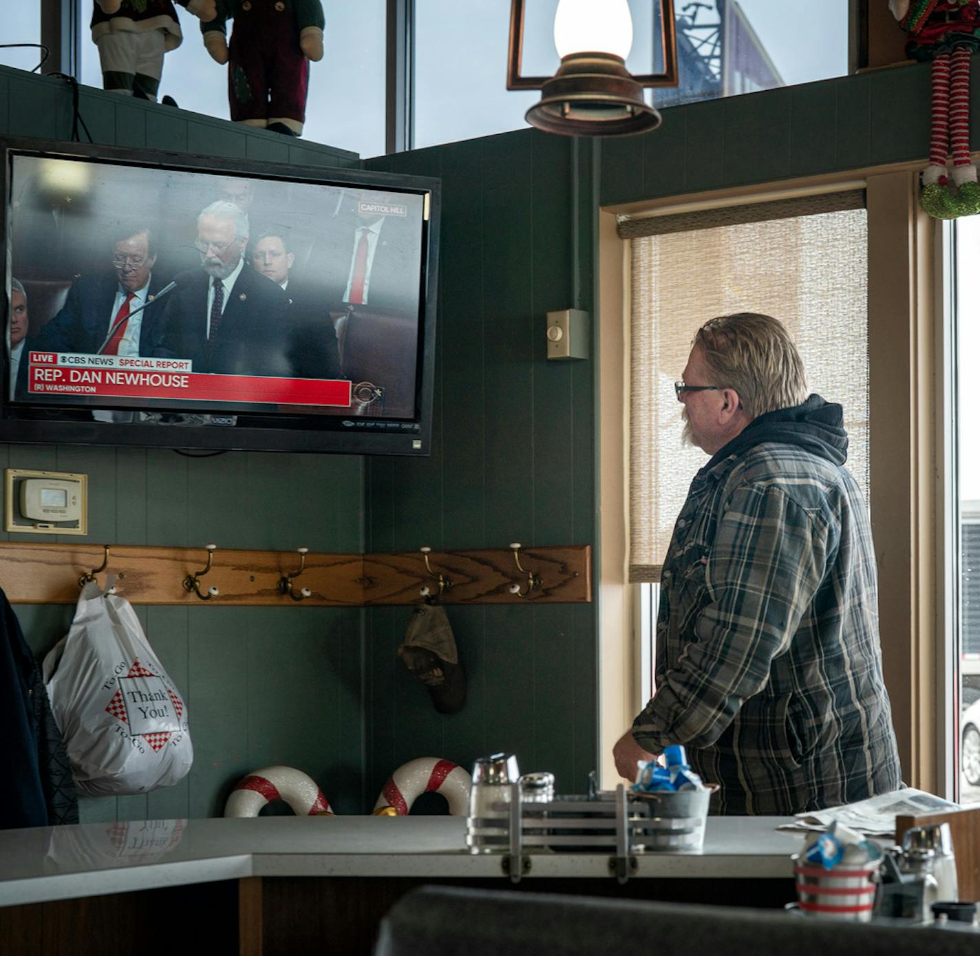 Dana Tomason, a truck driver from northwestern Iowa, is sick of hearing about impeachment. He believes the push from Democrats is helping the president, especially among swing voters.