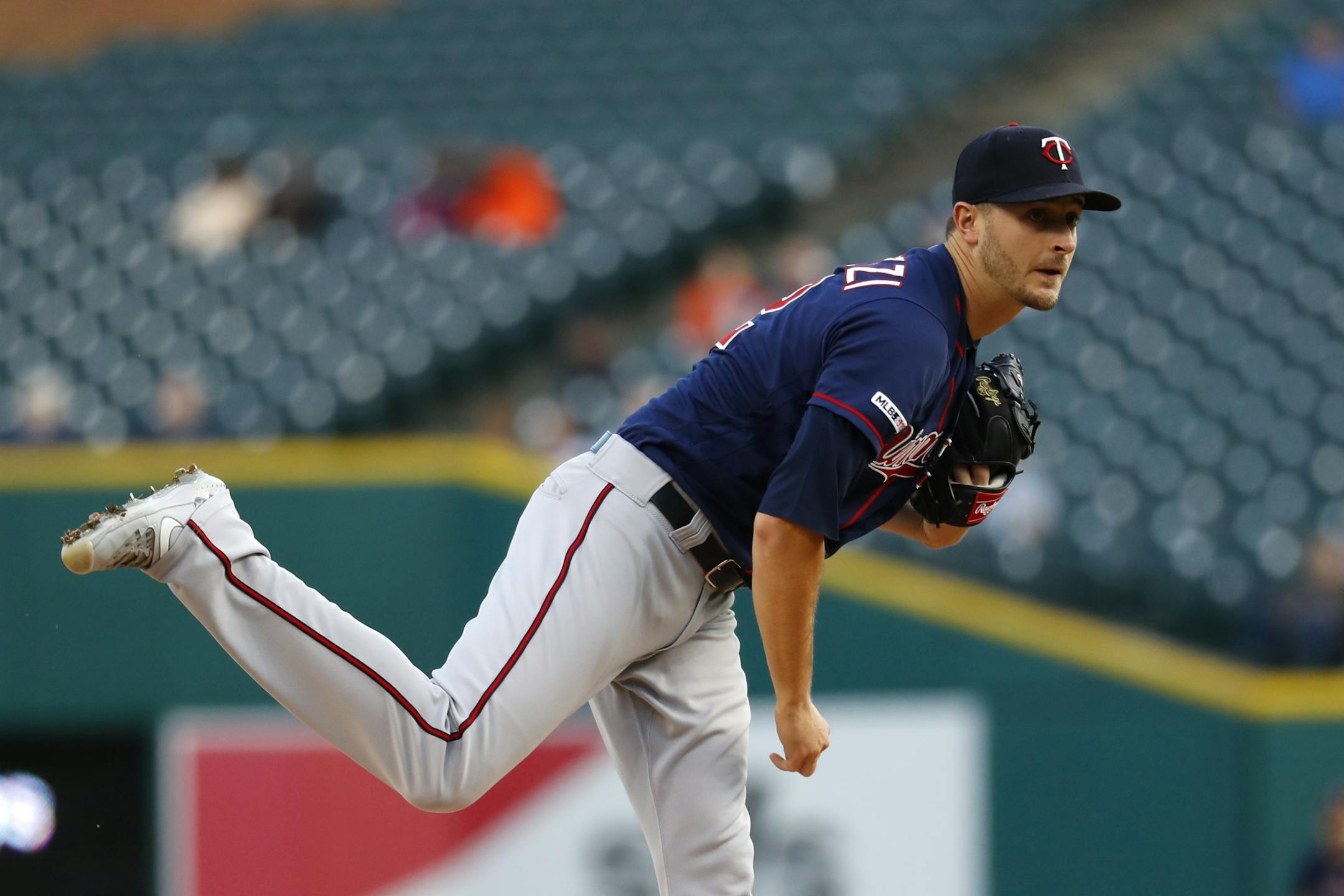 Minnesota Twins pitcher Jake Odorizzi watches a throw to a Detroit Tigers batter during the first inning of a baseball game in Detroit, Tuesday, Sept. 24, 2019.