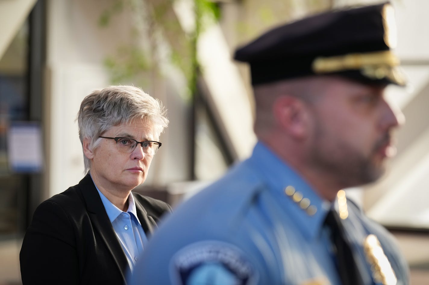 Hennepin County Attorney Mary Moriarty listened to Minneapolis Police Chief Brian O'Hara at a news conference in January.