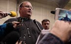 Tracy Claeys addresses the media at the U of M on Sunday evening 12/18/16 about his status as head coach of the Gophers football team.]Richard Tsong-T