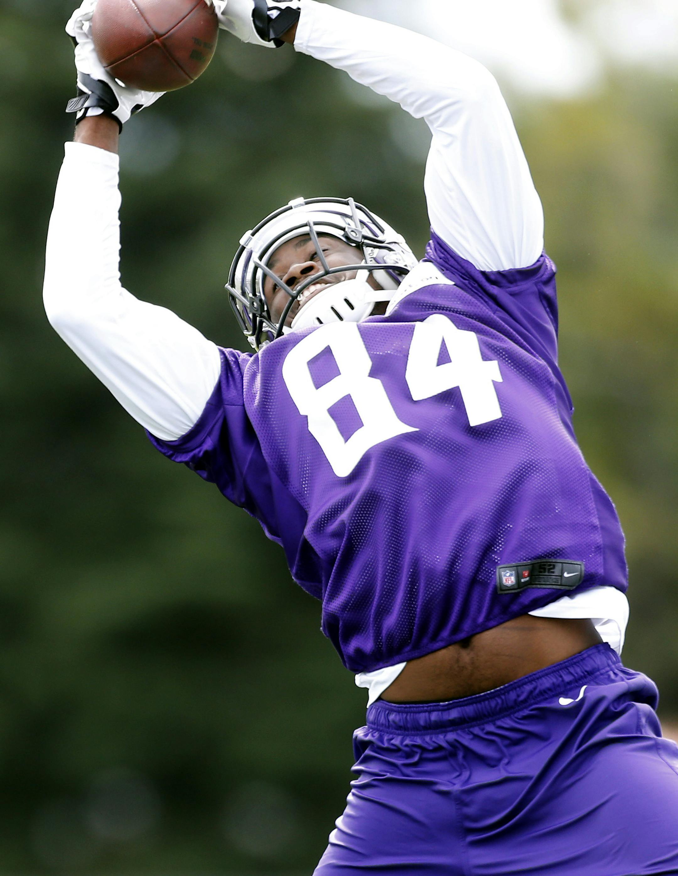Minnesota Vikings receiver Cordarrelle Paterson (84) made a leaping catch during the afternoon practice on Saturday. ] CARLOS GONZALEZ cgonzalez@startribune.com July 27, 2013, Minnesota Vikings Training Camp, Mankato, Minn., Minnesota State University, Mankato -