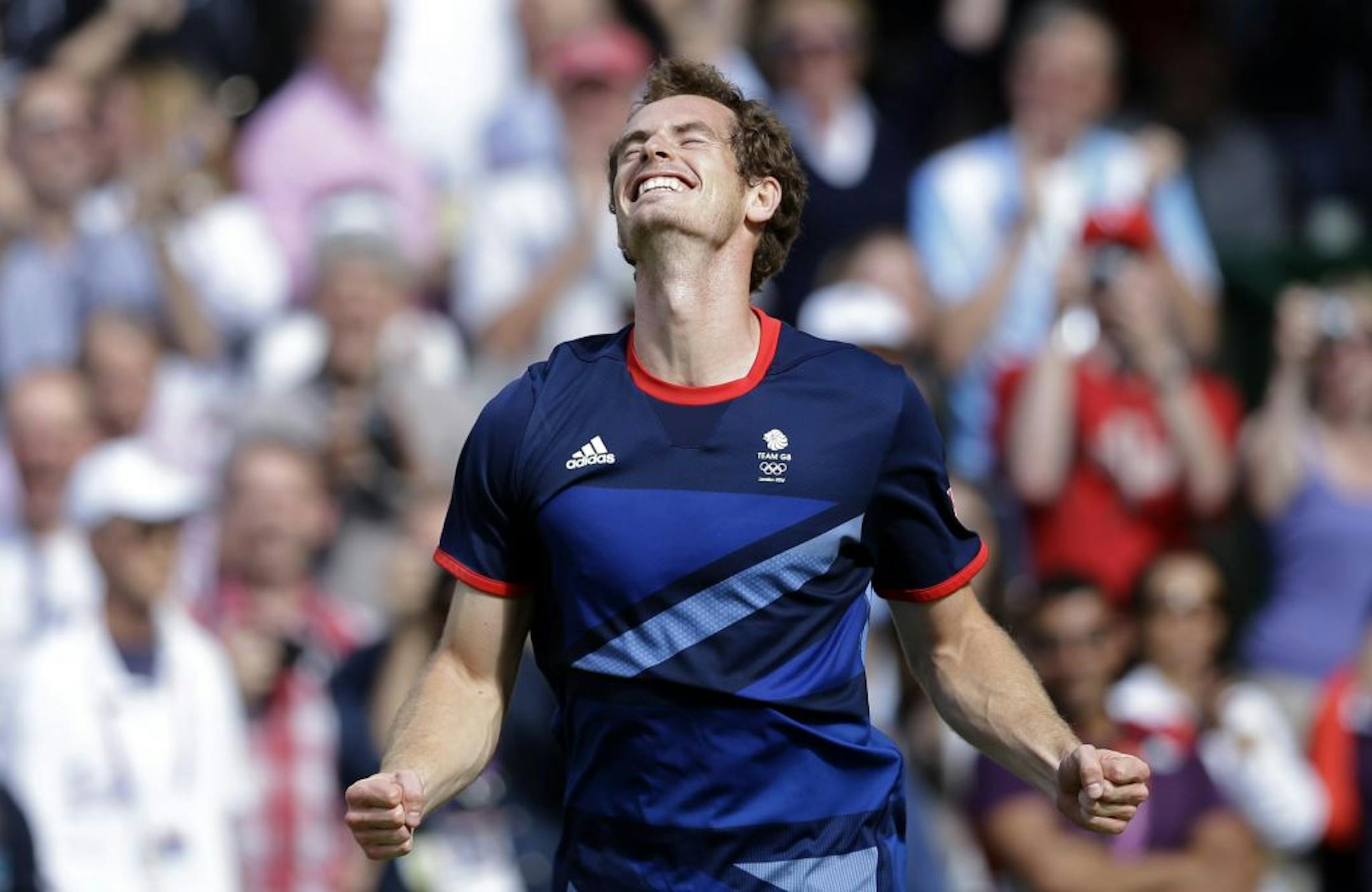Britain's Andy Murray celebrates after defeating Switzerland's Roger Federer to win the men's singles gold medal match at the All England Lawn Tennis Club at Wimbledon, in London, at the 2012 Summer Olympics, Sunday, Aug. 5, 2012.