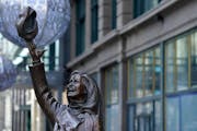 The Mary Tyler Moore statue held her ever present smile despite the Coronavirus pandemic Saturday on Nicollet Mall.