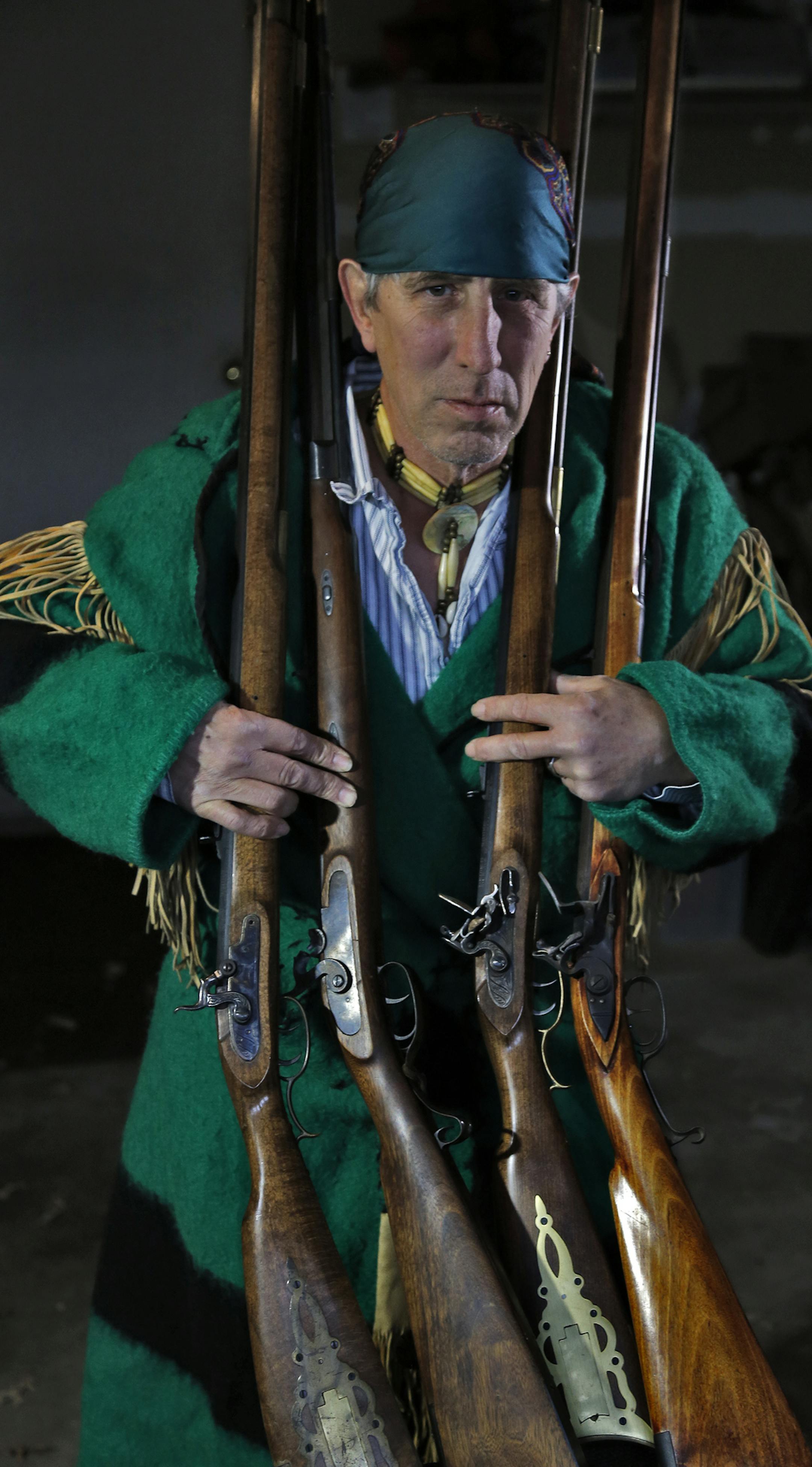 Muzzleloader enthusiast Jim Townsend of Andover wearing 1800's hunting clothing holds a variety of muzzleloaders. (MARLIN LEVISON/STARTRIBUNE(mlevison@startribune.com) ORG XMIT: MIN1311202126260840