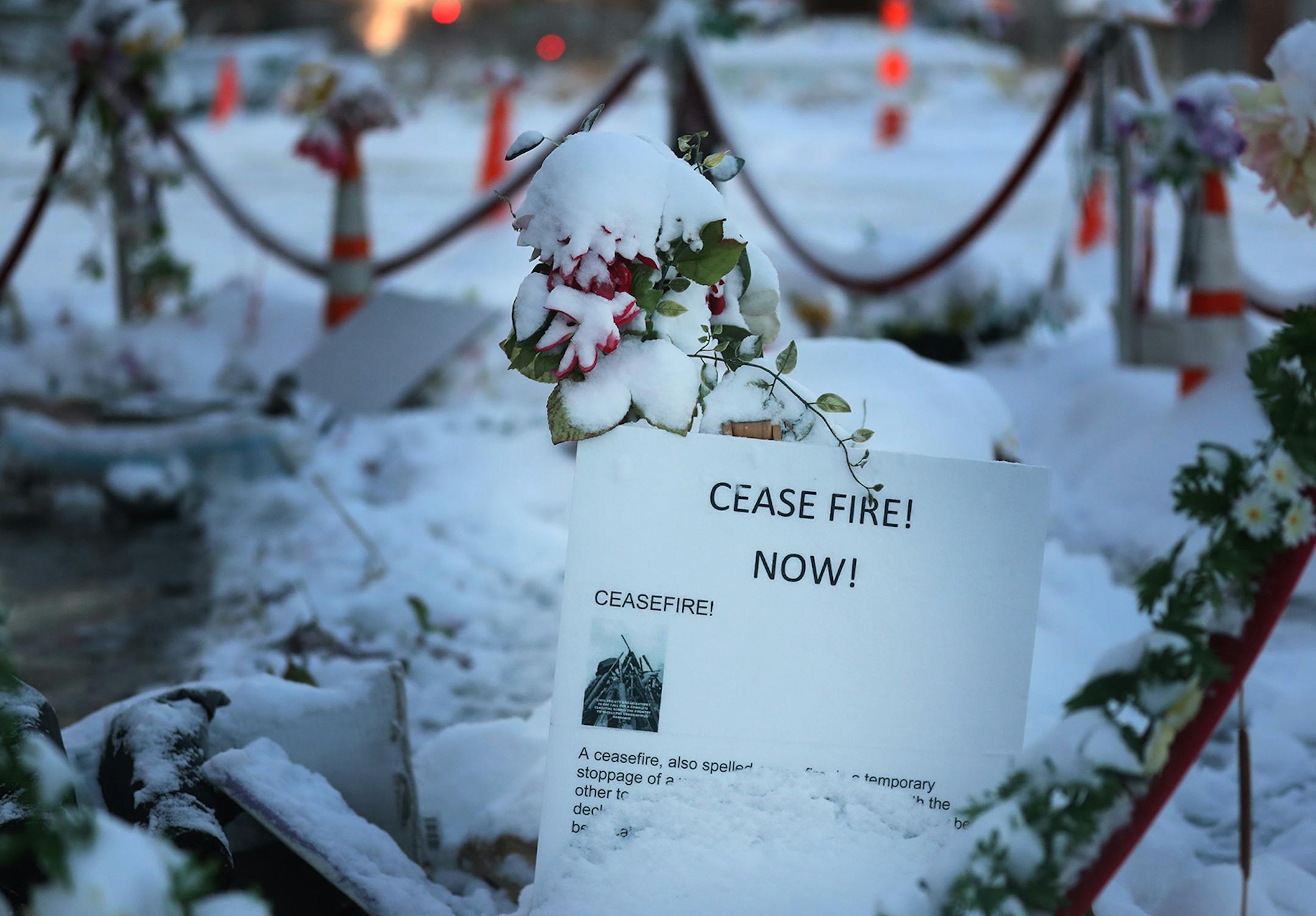 Fresh snow coats a sign at George Floyd Square at 38th and Chicago Ave. S. Wednesday in Minneapolis.