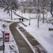 Students walk across campus at St. Cloud State University in March 2022.