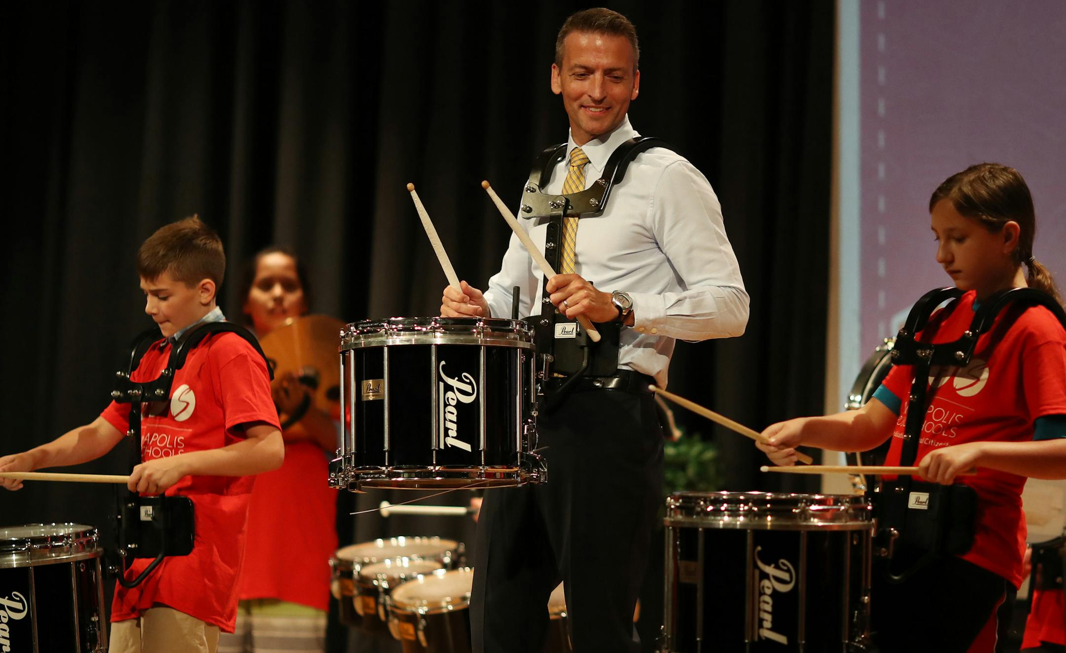 Minneapolis school Superintendent Ed Graff played drums with members of the Gems and Gise drum group after giving his state of the schools address Monday August 20, 2018 at North Community High School in Minneapolis, MN.] JERRY HOLT ï jerry.holt@startribune.com