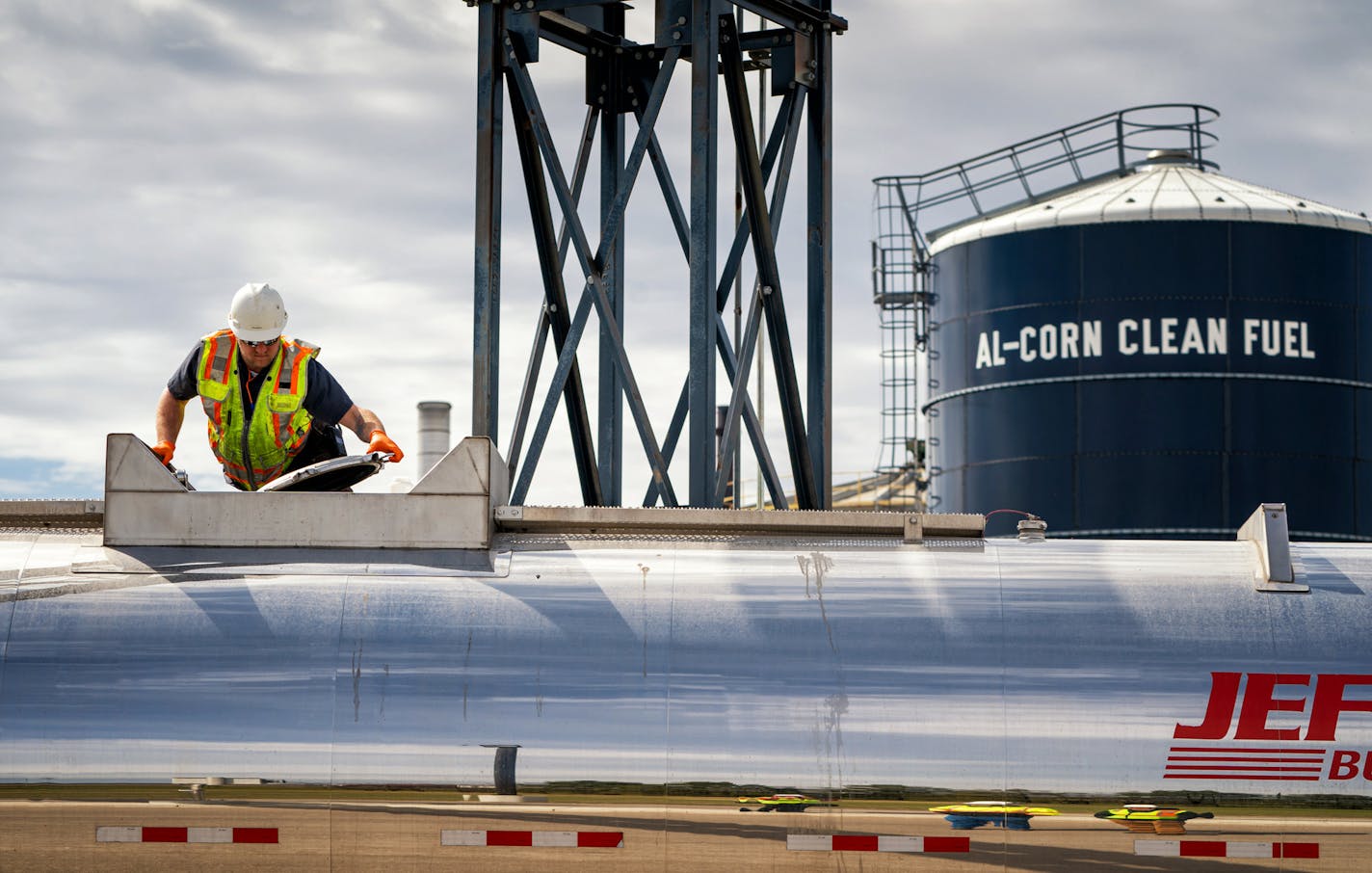 Ben Smith prepared to pour denaturing agent into 7,000 gallons of industrial ethanol, to be used in hand sanitizer. It was produced at Al-Corn Clean Fuel ethanol plant in Claremont. (GLEN STUBBE/Star Tribune)