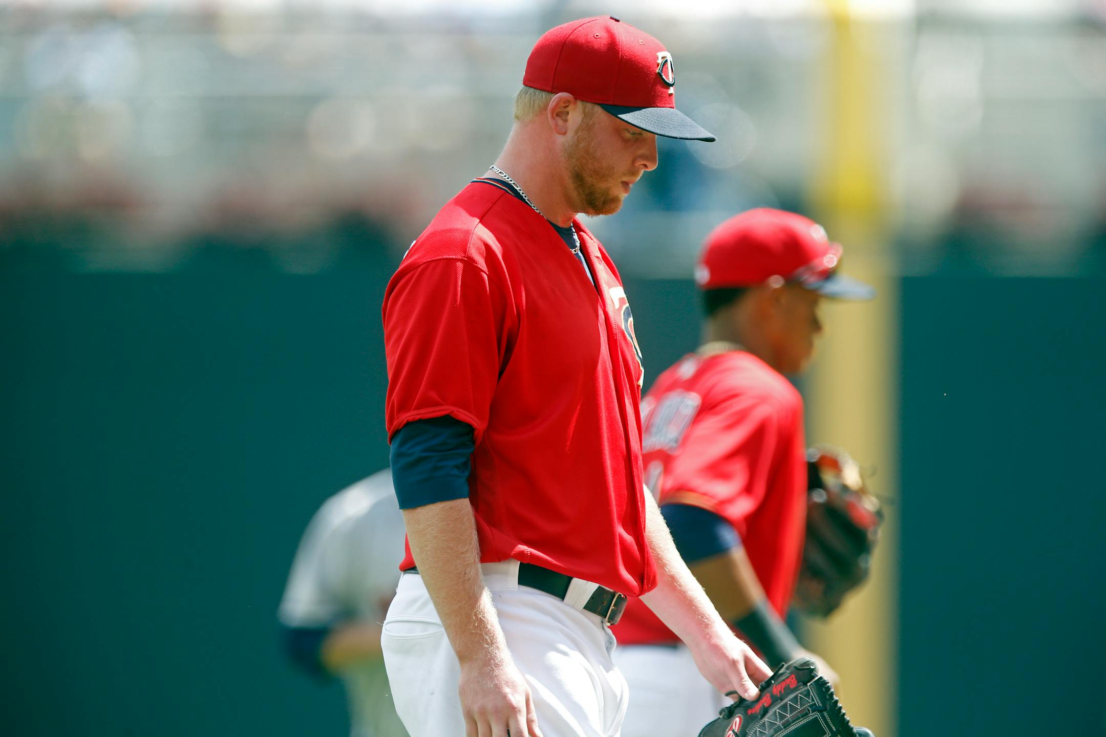 Minnesota Twins pitcher Buddy Boshers heads to the dugout at the end of the fifth inning in a baseball game against the Houston Astros, Thursday, Aug. 11, 2016 in Minneapolis. Boshers gave up six runs in the inning. The Astros won 15-7. (AP Photo/Jim Mone)