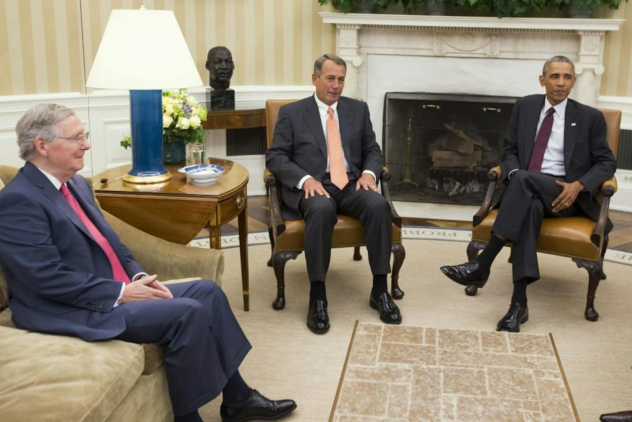 FILE - In this Sept. 9, 2014 file photo, President Barack Obama meets with Senate Minority Leader Mitch McConnell of Ky., left, and House Speaker John Boehner of Ohio in the Oval Office of the White House in Washington. It may be only 2015 but the year ahead is likely to be filled with 2016 presidential politics. Plus, fights between Congress and President Barack Obama. Plus, a further ramp-up in wars that were supposed to be winding down. A look ahead at what�s in store from Washington in the y