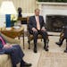 FILE - In this Sept. 9, 2014 file photo, President Barack Obama meets with Senate Minority Leader Mitch McConnell of Ky., left, and House Speaker John