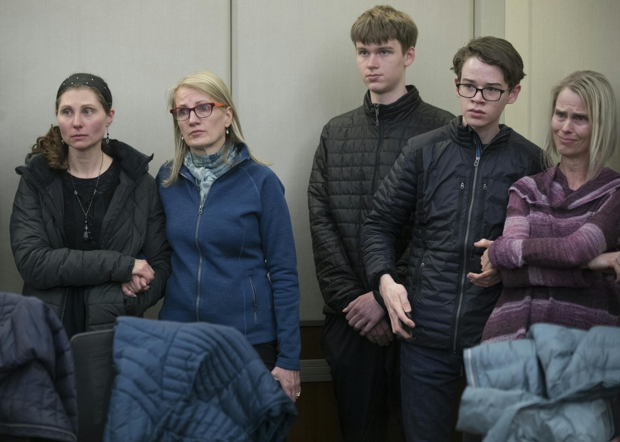 Neighbors of of Justine looked on as ,Hennepin County Attorney Mike Freeman described the charges against Minneapolis Police officer Mohamed Noor.