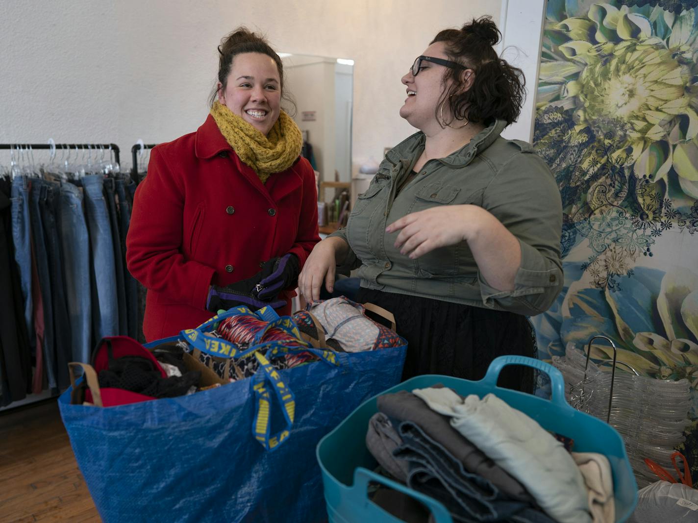 Kristen Jonet left, bought a bag clothing in to sell to Cat Polivoda owner at Cake Plus-Size Resale Sunday January 27, 2019 in Minneapolis, MN.] Jerry Holt &#x2022; Jerry.holt@startribune.com