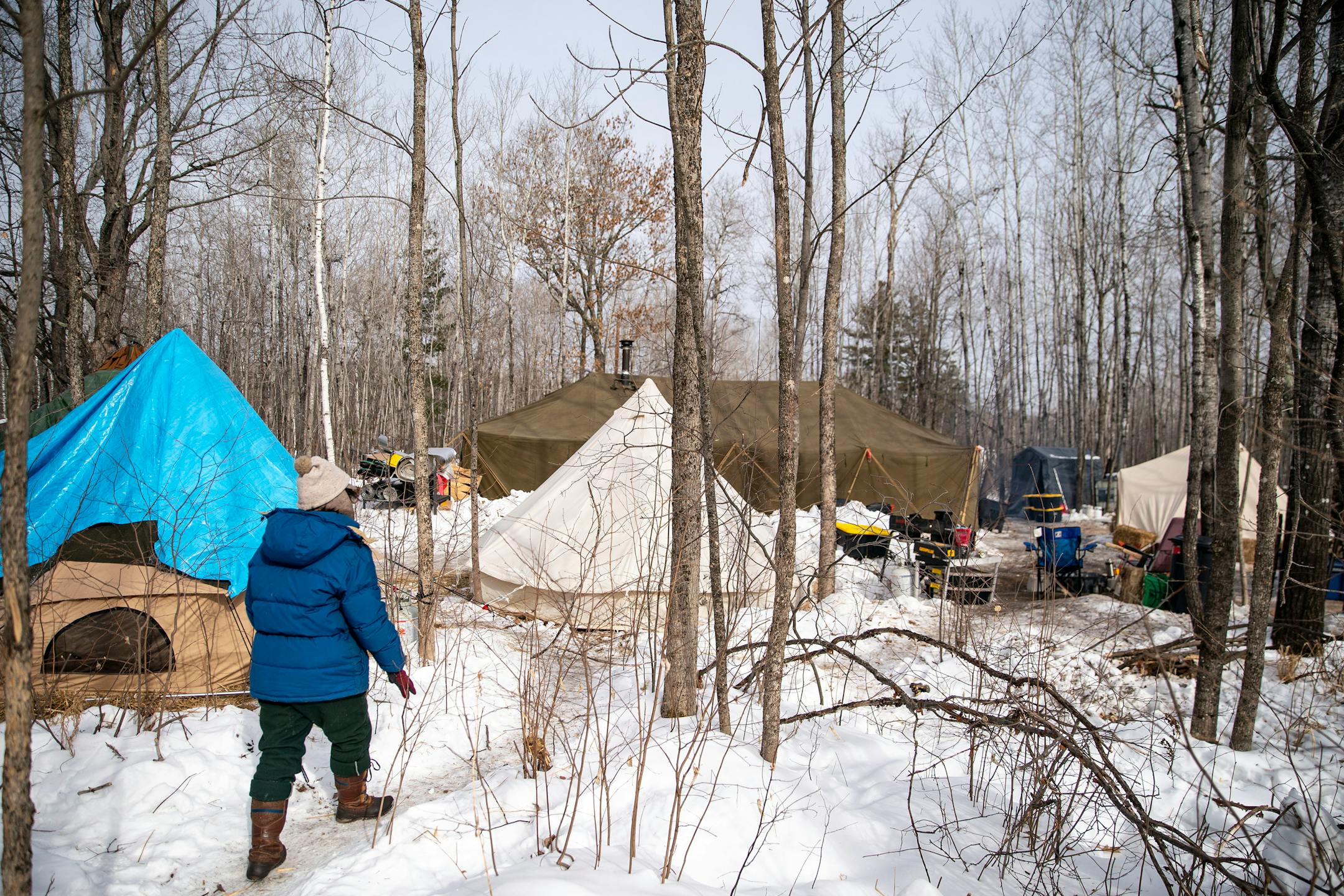 Alex Golden-Wolf walked through Camp Migizi, a small encampment of mostly indigenous water and land protectors located right beside the Enbridge Line 3 construction site on the Fond Du Lac Native American reservation in Cloquet.