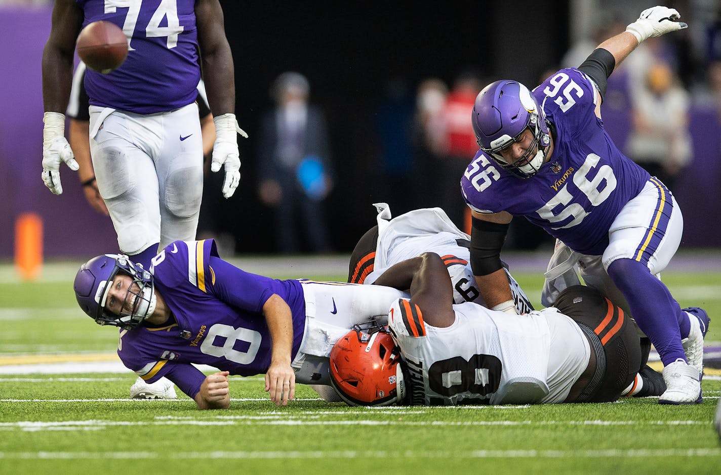 Minnesota Vikings quarterback Kirk Cousins (8) was forced too through and incomplete pass by Cleveland Browns defensive tackle Malik McDowell (58) late in the fourth quarter .] Jerry Holt •Jerry.Holt@startribune.com