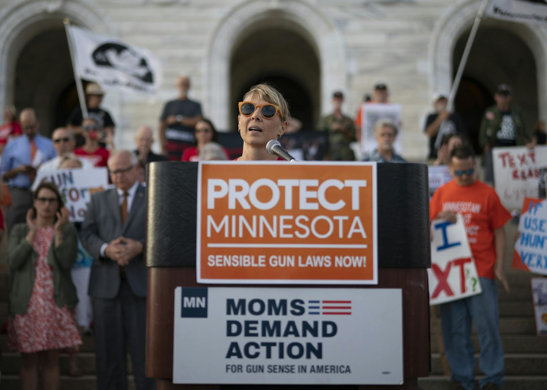 Molly Leutz, of MN Moms Demand Action, one of the two groups that organized the event, addressed the crowd. ] JEFF WHEELER &#x2022; jeff.wheeler@startribune.com Minnesota Gov. Tim Walz addessed a crowd gathered for a rally Wednesday evening, August 7, 2019 on the steps of the State Capitol in St. Paul calling for legislation to end gun violence.