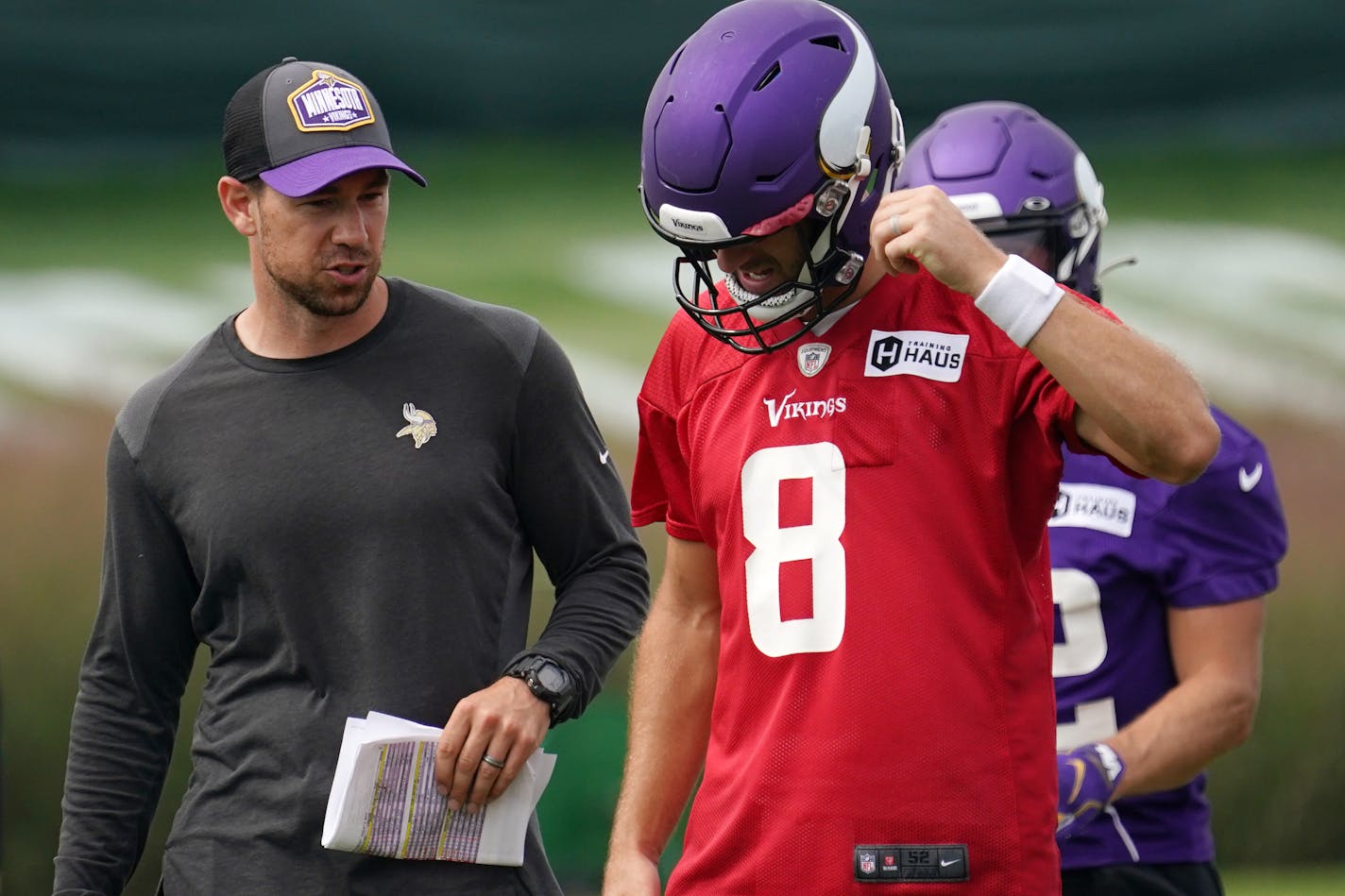 Minnesota Vikings offensive coordinator Klint Kubiak talked with quarterback Kirk Cousins (8) during training camp Thursday. ] ANTHONY SOUFFLE • anthony.souffle@startribune.com