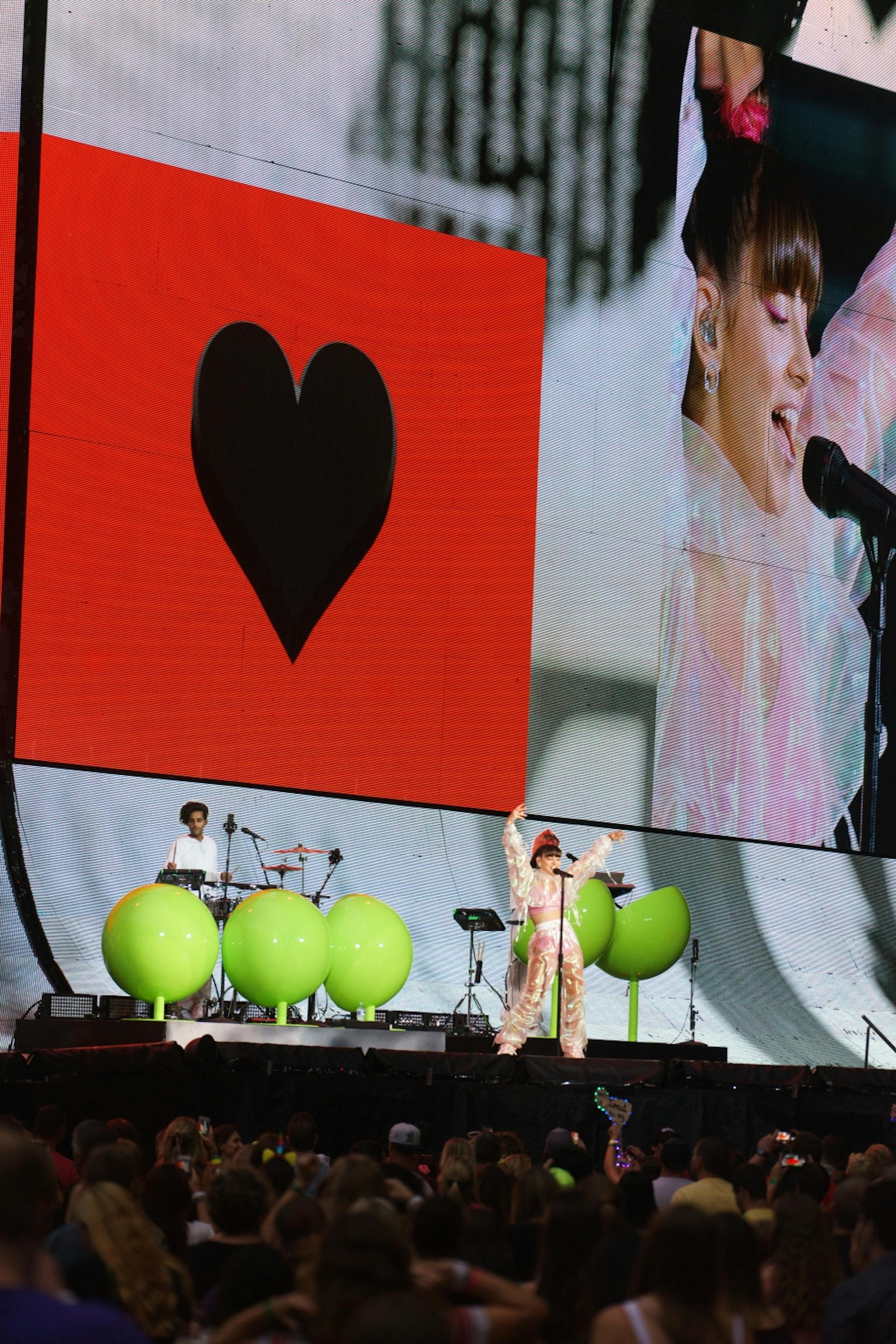 British pop star Charli XCX and red-hot pop singer Camila Cabello of "Havana" opened for Taylor Swift. In this photo, Charli appeared to be wearing a baggy jumpsuit made out of saran wrap.