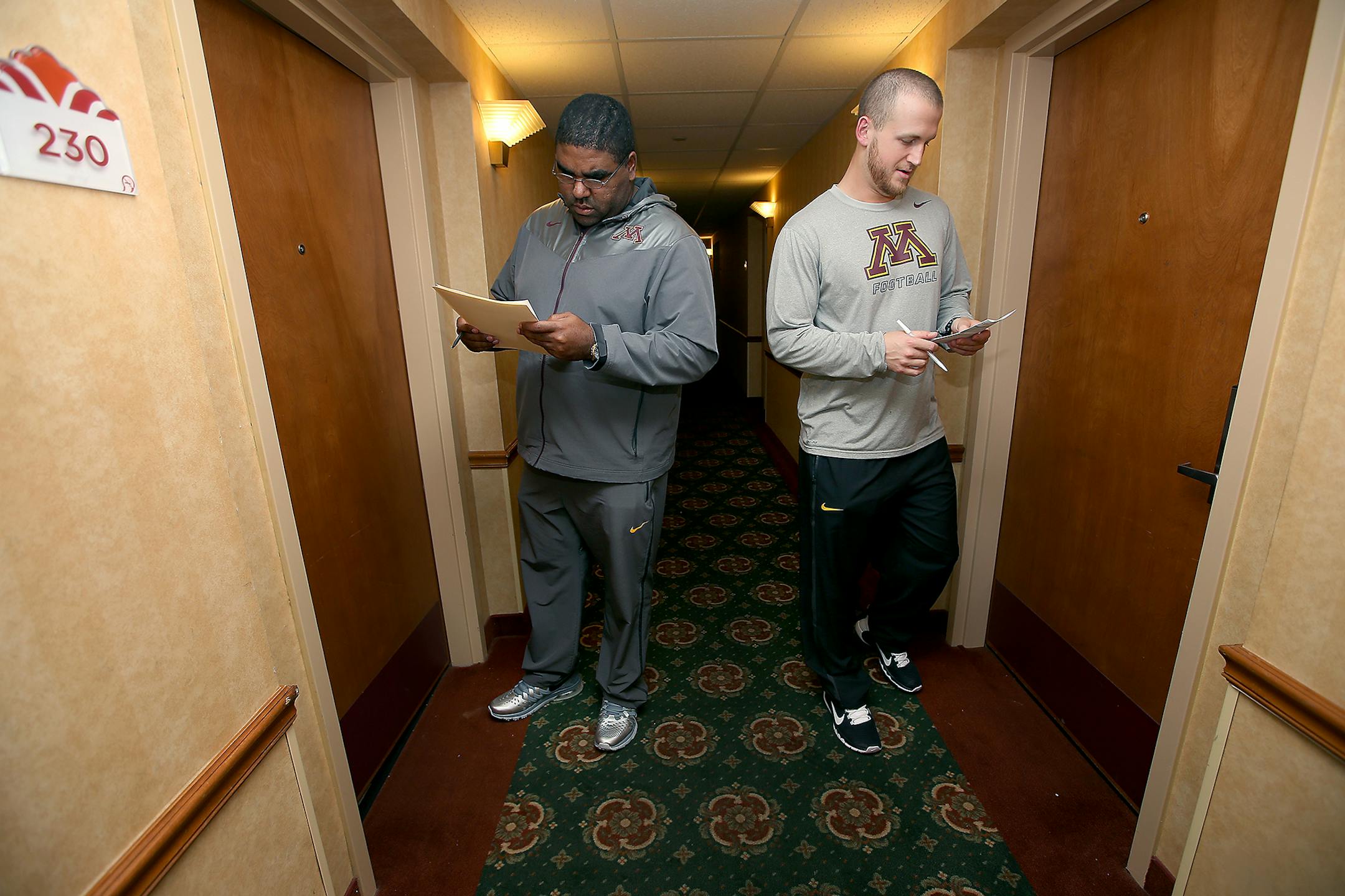 10:05 p.m. Friday: Gophers director of player personnel Jeff Jones, left, and operations assistant Mike Valesano conducted their bed check, making sure players were in their rooms with no visitors.