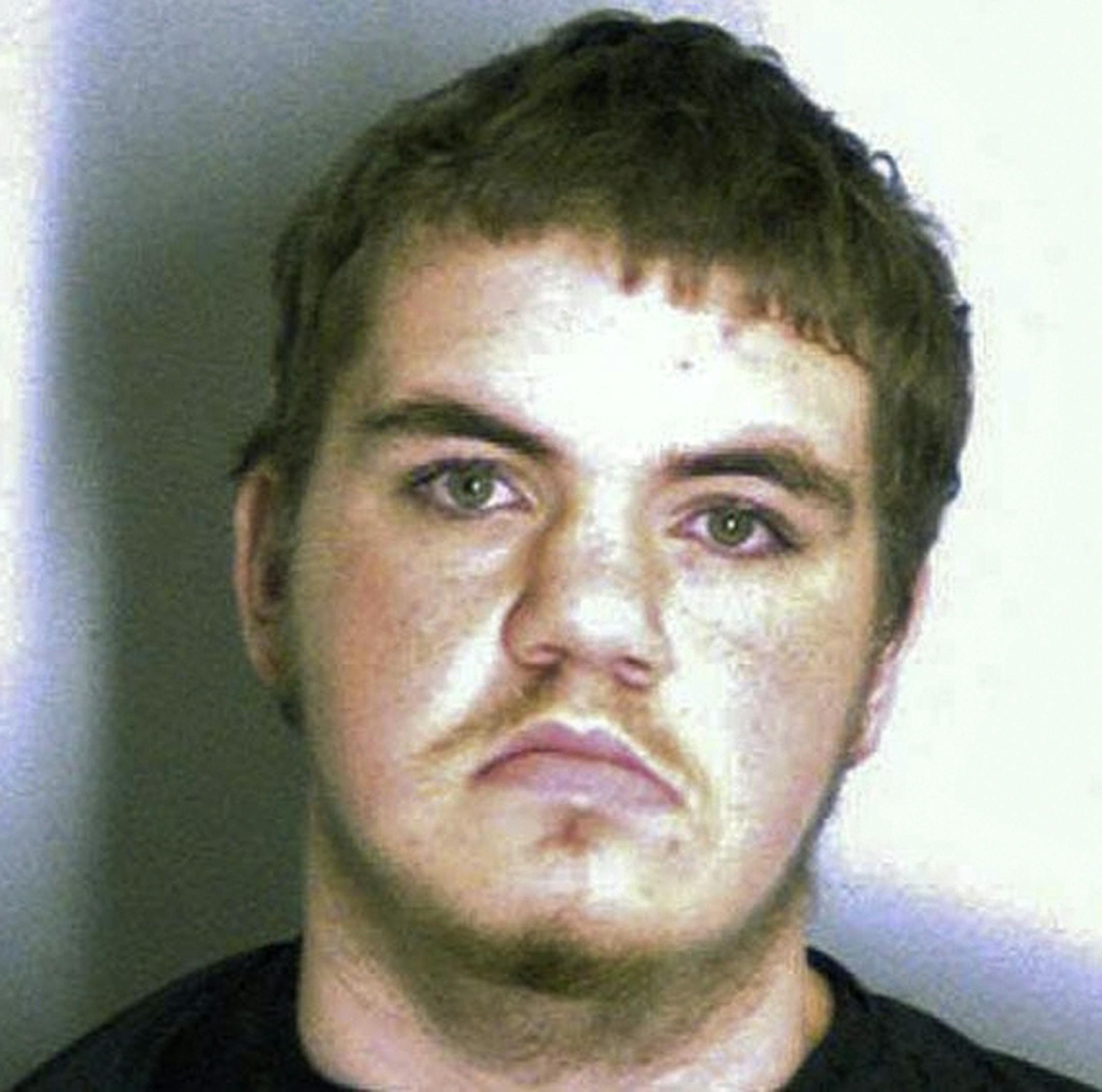 Michael Brandon Hill, 20, faces numerous charges in relation to a school invasion.