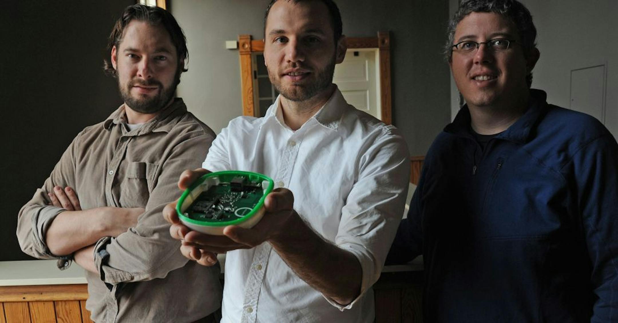 From left, Ben Edwards, Scott Vlaminck and Jesse O'Neill-Oine are co-partners of SmartThings. Vlaminck held the hub that is the heart of the device, which remotely operates household technology.