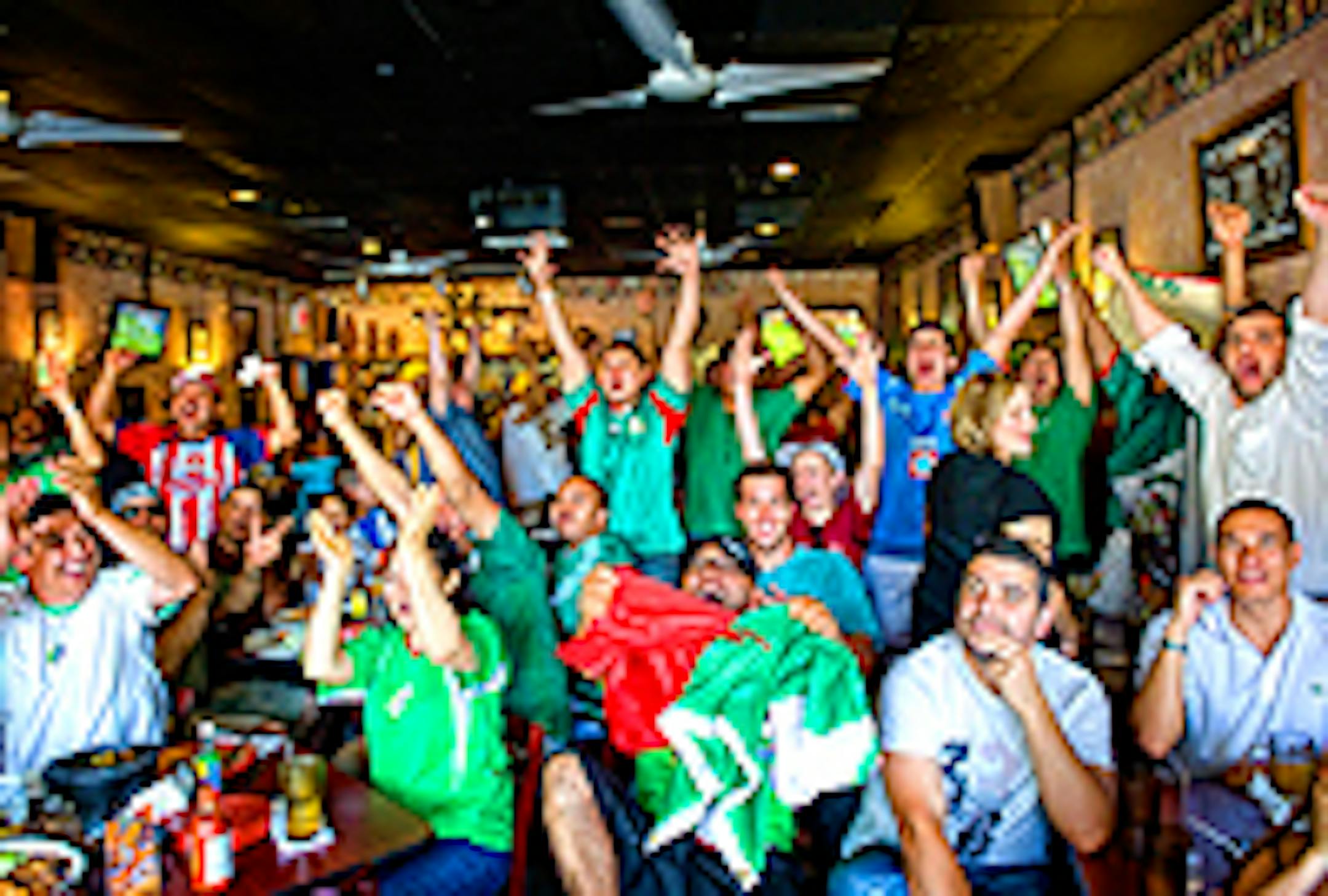 Gooooal! The crowd at Pancho Villa Restaurant went wild when Mexico went up 1-0 against France on July 17.