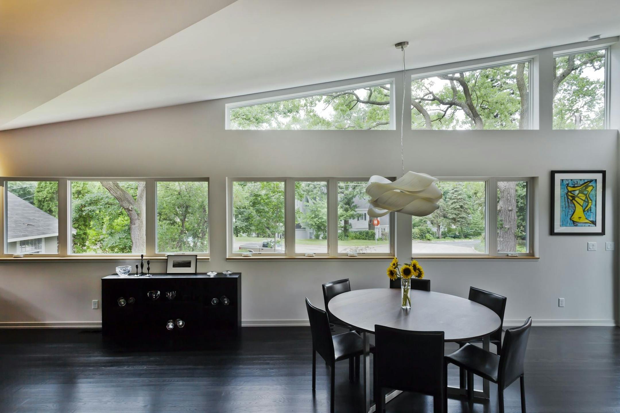 Home of the Month: RoehrSchmitt Architecture translated the best features of a family's downtown loft into a new modern home . Credit Gilbertson Photography