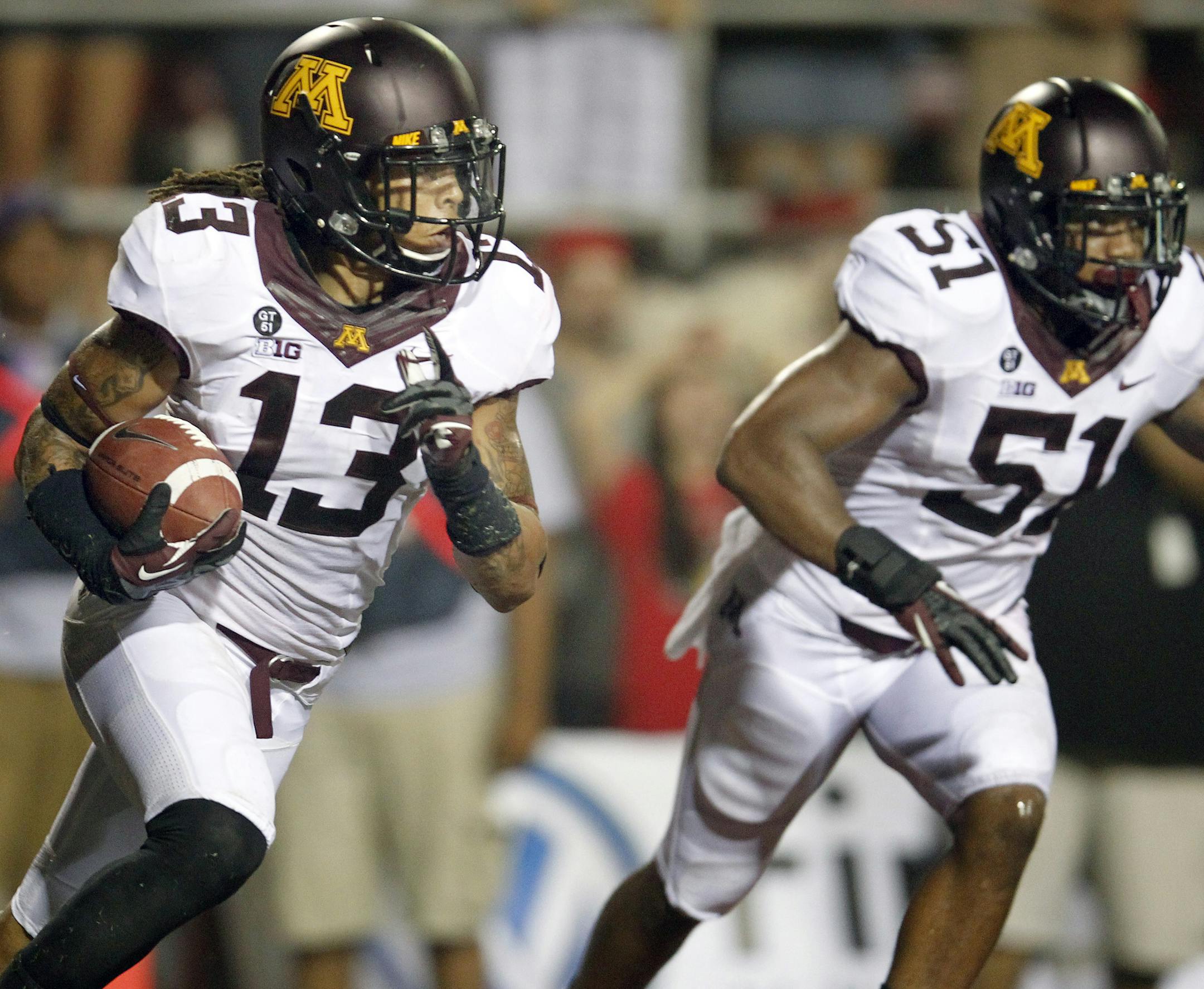 Derrick Wells (13) started the 2012 Gophers football season with a bang, intercepting two passes against UNLV.