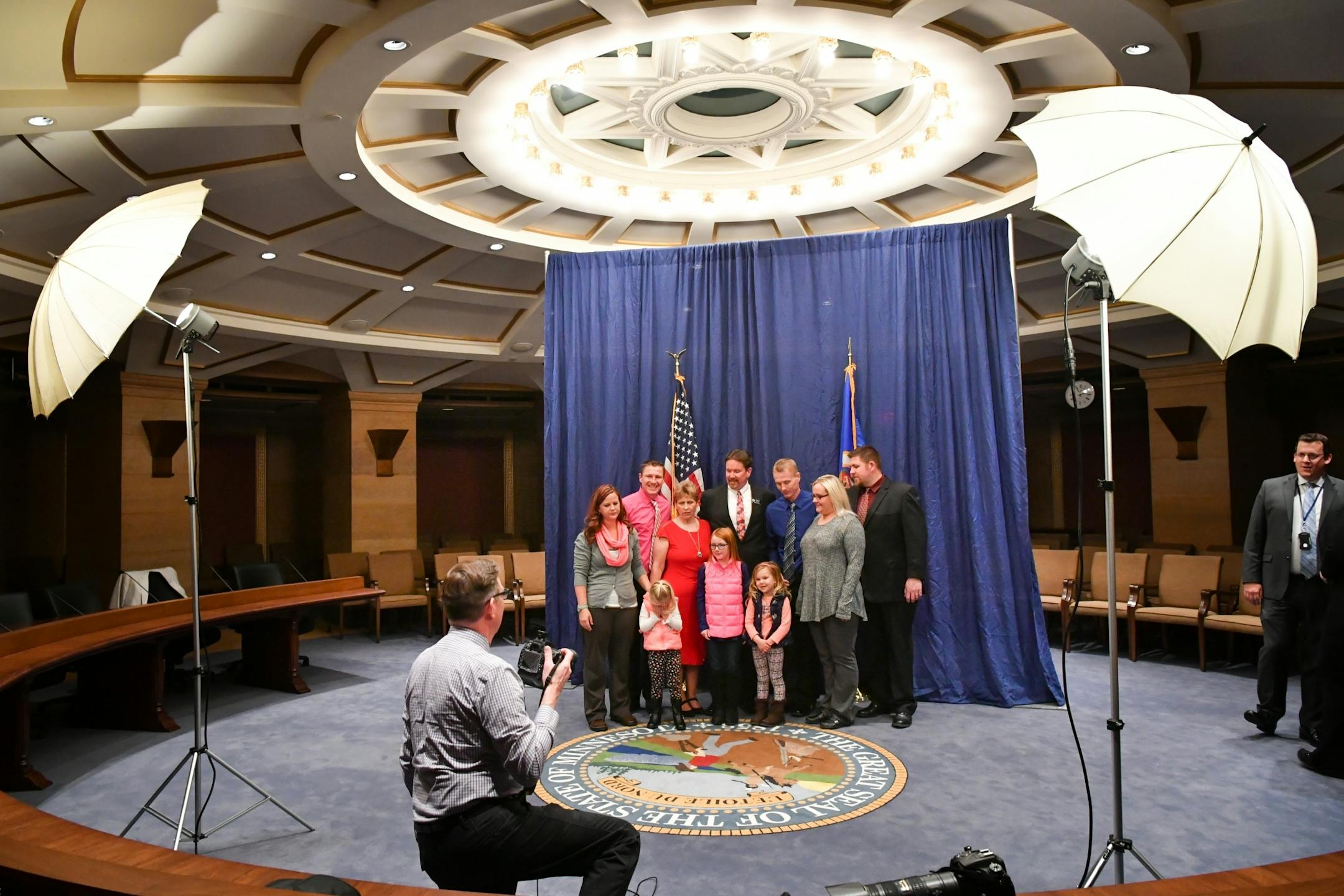 Senate photographer David Oakes photographed Senator Mark Koran, R-North Branch, and his family. His granddaughter McKaila, 4, wasn't sure she wanted to take part and put her hands over her face.