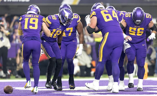 Vikings lineman Blake Brandel (64) takes a try at the Griddy with Justin Jefferson and his teammates after a touchdown against the Patriots last seaso