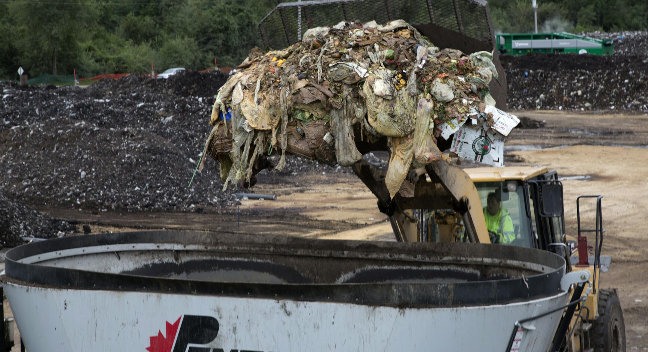 The largest experiment in organics recycling in Minnesota is slated to commence next year when Minneapolis rolls out a new program to capture the food waste that now gets sent to the garbage burner. It's an opt-in program, but all homeowners will see a $48 increase in their solid waste bills. (IN THIS PHOTO) A fresh load of organic food waste is dumped into a mixing bin to begin the process of creating compost. ] BRIAN PETERSON ‚Ä¢ brian.peterson@startribune.com Rosemount, MN 09
