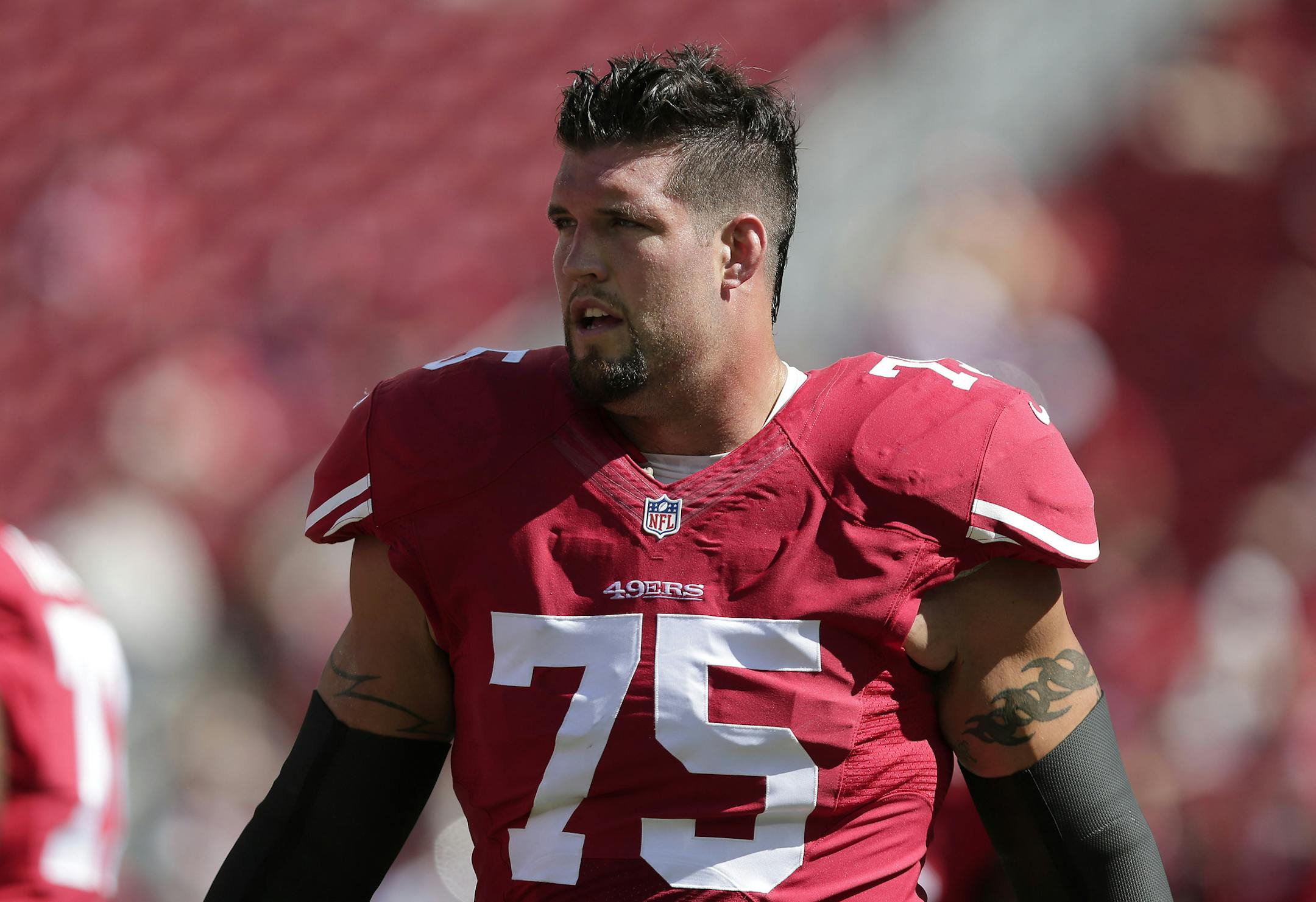 San Francisco 49ers offensive tackle Alex Boone (75) warms up before an NFL football game against the Kansas City Chiefs in Santa Clara, Calif., Sunday, Oct. 5, 2014. (AP Photo/Marcio Jose Sanchez) ORG XMIT: FXN