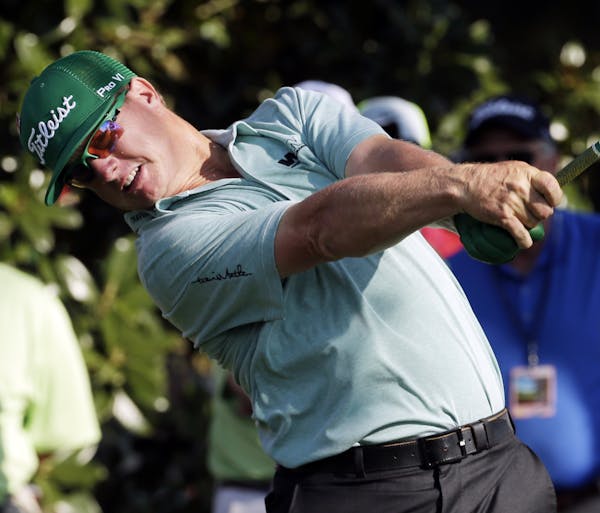 Charley Hoffman tees off on the ninth hole during the first round of the Masters golf tournament Thursday, April 9, 2015, in Augusta, Ga. (AP Photo/Ch