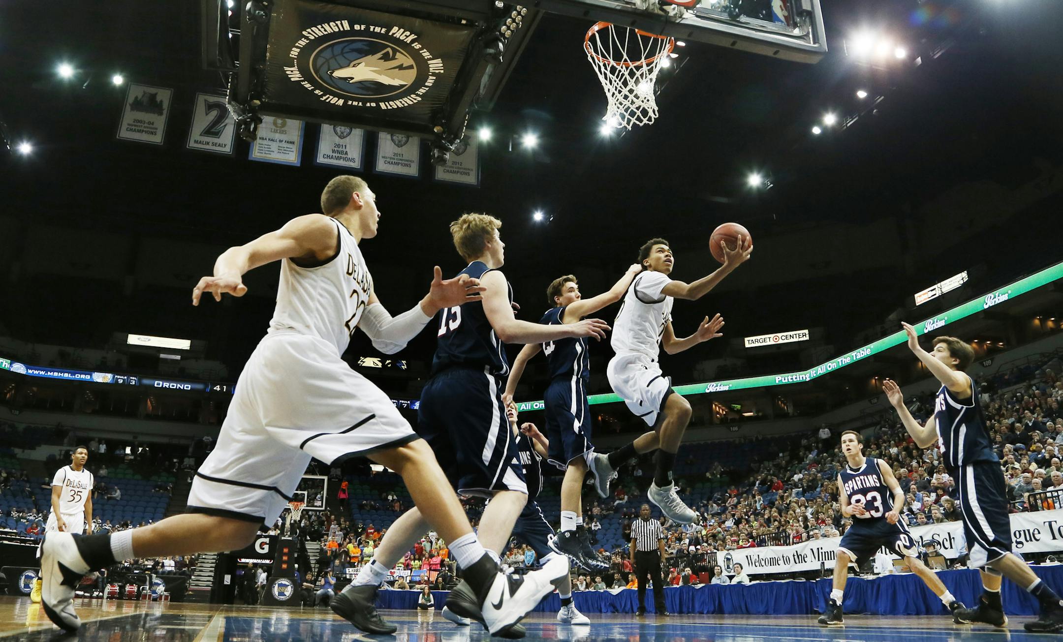 Geno Crandall scored on layup during class 3A Minnesota State boys basketball tournament between DeLaSalle and Orono at Target Center March 13, 2014 in Minneapolis, MN. ] JERRY HOLT jerry.holt@startribune.com