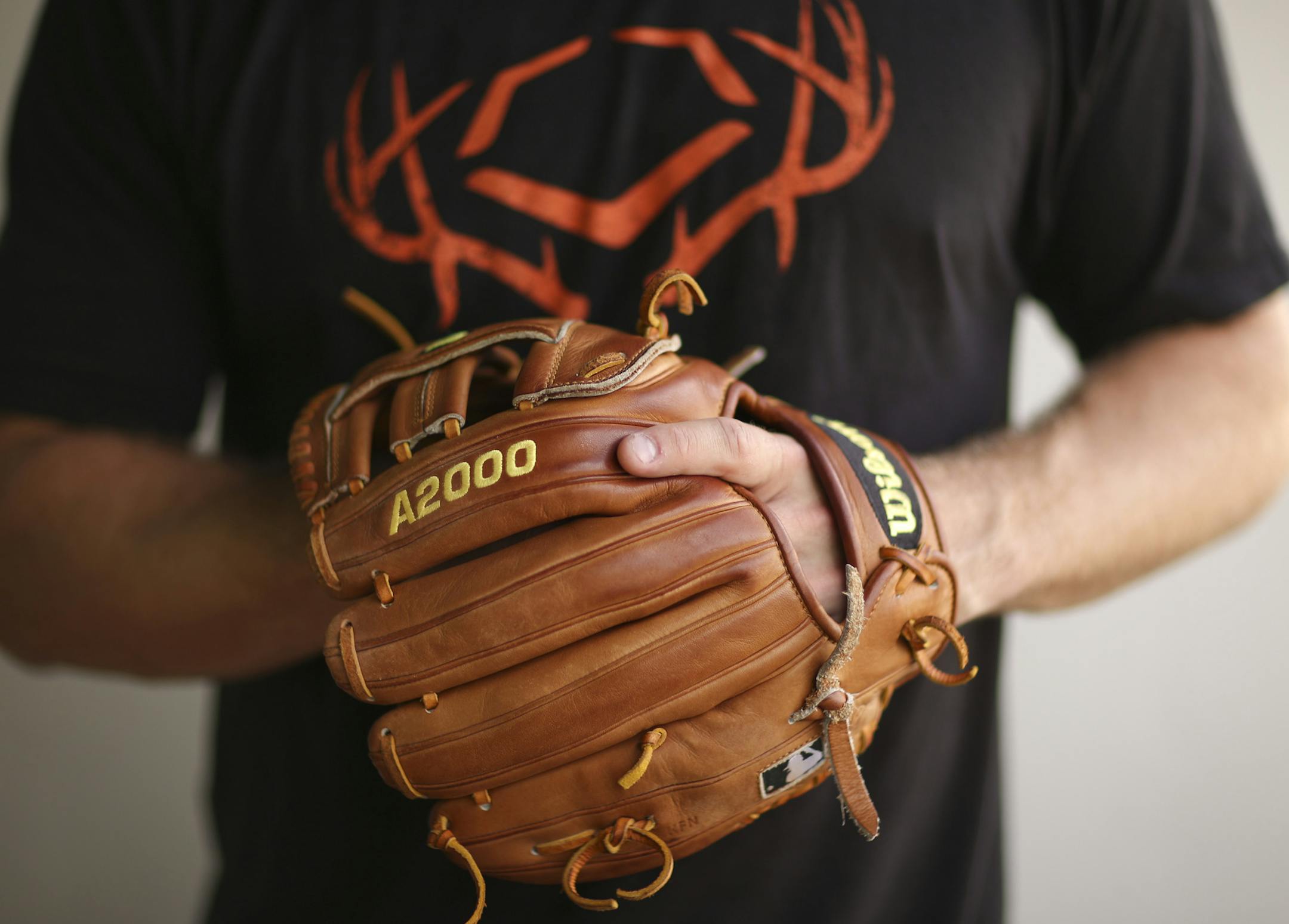 Twins second baseman Brian Dozier held his glove Wednesday afternoon at Hammond Stadium in Fort Myers. ] JEFF WHEELER ï jeff.wheeler@startribune.com The Twins played their first exhibition baseball game against the University of Minnesota team Wednesday night, March 4, 2015, at Hammond Stadium in Fort Myers, FL.