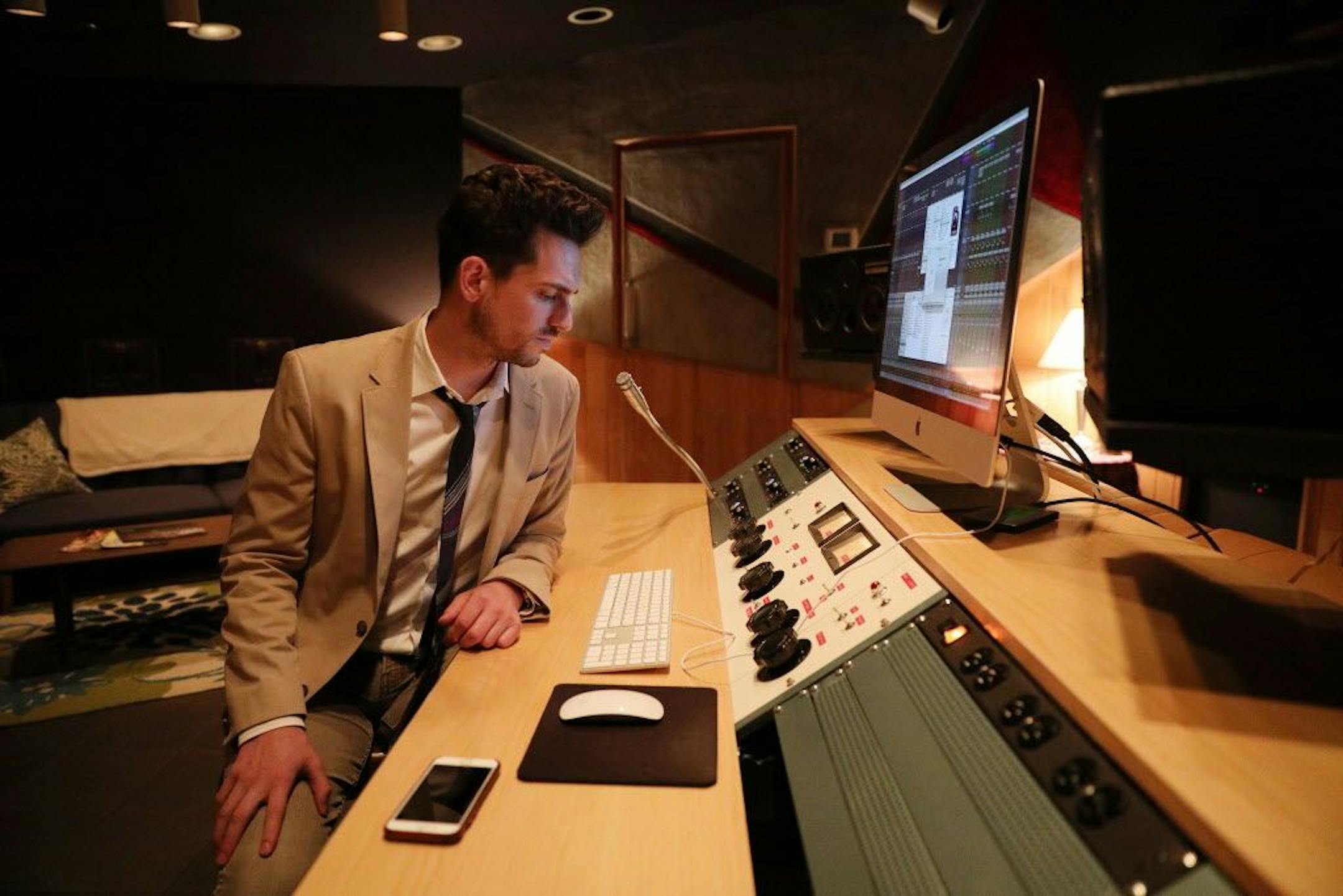 Jason Miller sat in the engineering room for Studio A in the former Flyte Tyme Studios.
