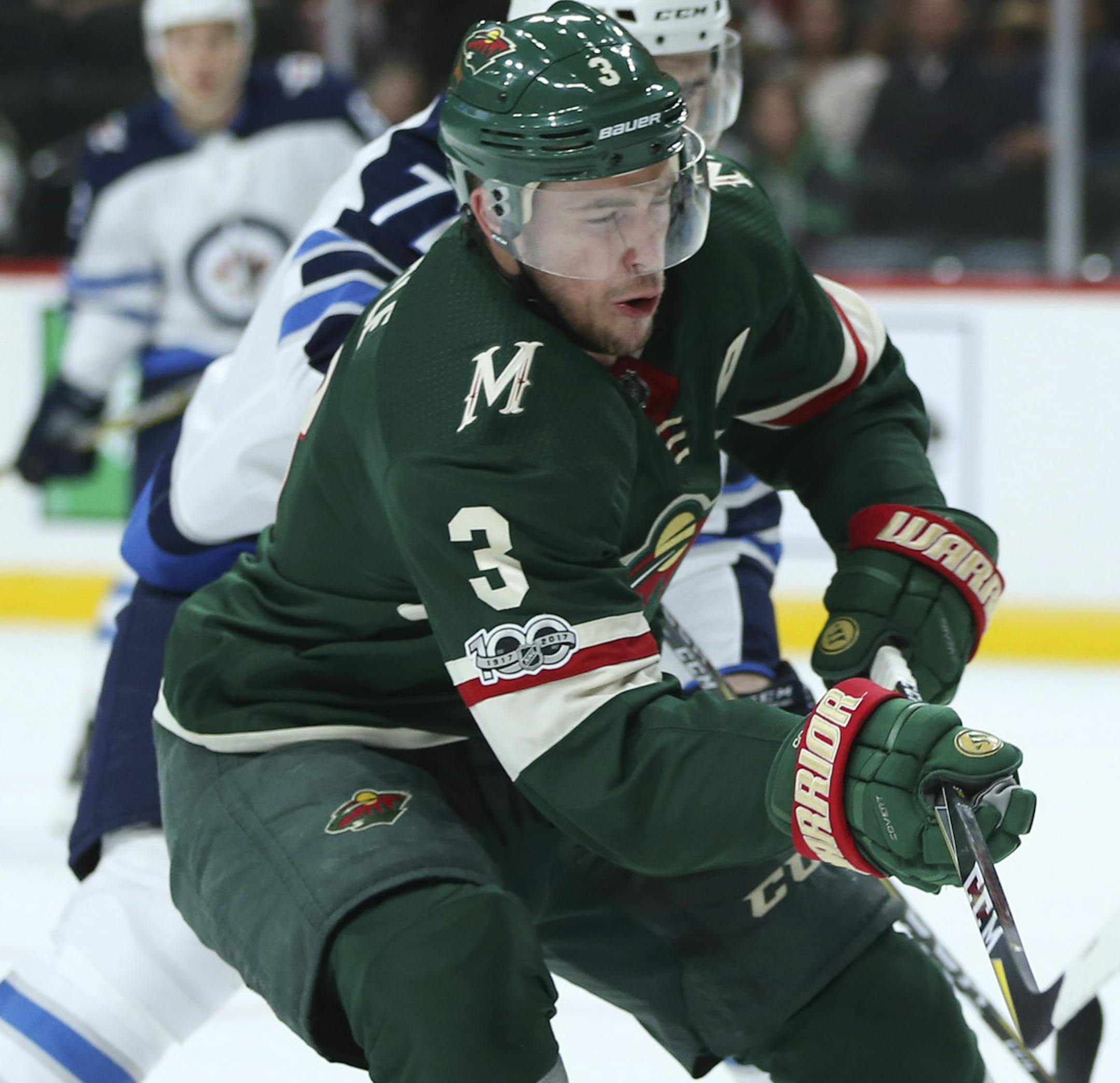 Minnesota Wild center Charlie Coyle (3) tried to knock down the puck being cleared by Winnipeg Jets goalie Connor Hellebuyck (37) in the first period. He was defended bythe Jets' Julian Melchiori (71). ] JEFF WHEELER ï jeff.wheeler@startribune.com The Minnesota Wild faced the Winnipeg Jets in an NHL preseason game Thursday night, September 21, 2017 at Xcel Energy Center in St. Paul.