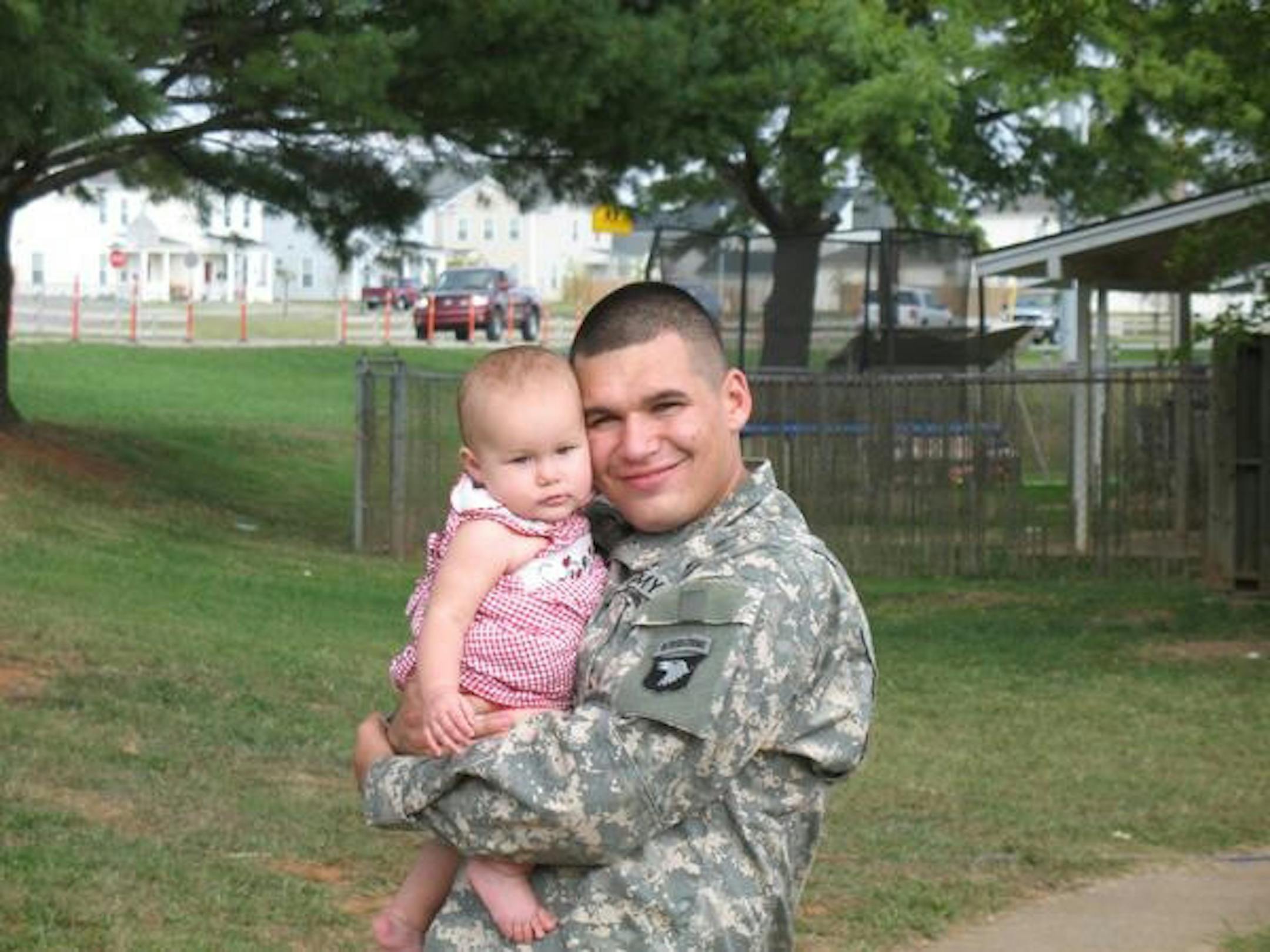 Spc. Jacob J. Fairbanks, 22, of Saint Paul, Minn., seen here with hi daughter, Kayla, died April 9 in Baghdad,Iraq, of injuries suffered in a non-combat related incident. He was assigned to the 1st Battalion, 320th Field Artillery Regiment, 2nd Brigade Combat Team, 101st Airborne Division (Air Assault), Fort Campbell, Ky.