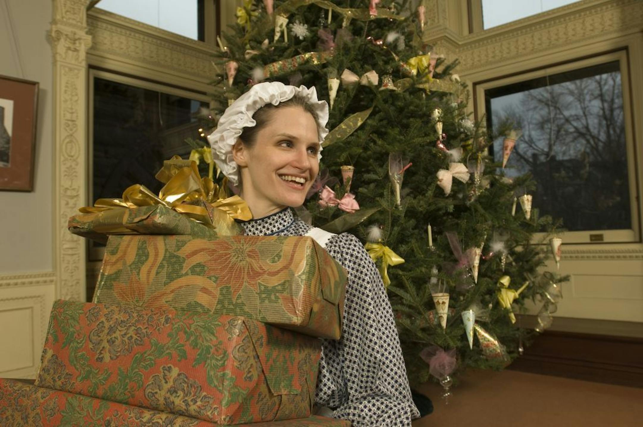 Actors portray servants in "Hill House Holidays" at the James J. Hill House.