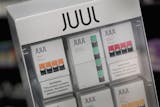 Under an agreement with 33 states, e-cigarette maker Juul will pay $438.5 million and refrain from all youth marketing, paid product placement, advertising on public transportation, funding education programs, depicting anyone under 35 years old in advertisement or using cartoons in ads, among other marketing activities. (Scott Olson/Getty Images/TNS) ORG XMIT: 57810322W