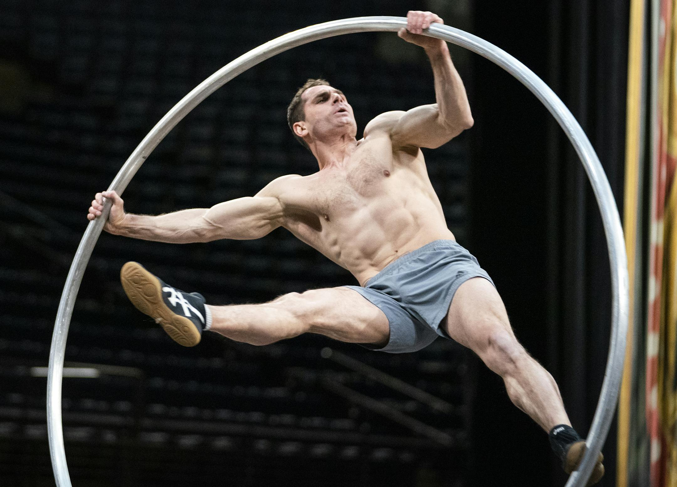 Dzmitry Labanau of Belarus rehearses on the Cyr wheel. ] LEILA NAVIDI • leila.navidi@startribune.com BACKGROUND INFORMATION: Rehearsals for the Cirque de Soleil arena production "Corteo" at Target Center in Minneapolis on Thursday, November 8, 2018. "Corteo," which means cortege in Italian, is a festive parade imagined by a clown. The cast of "Corteo" includes 51 acrobats, musicians, singers and actors from all around the world. The show will have a limited run of six performances from No