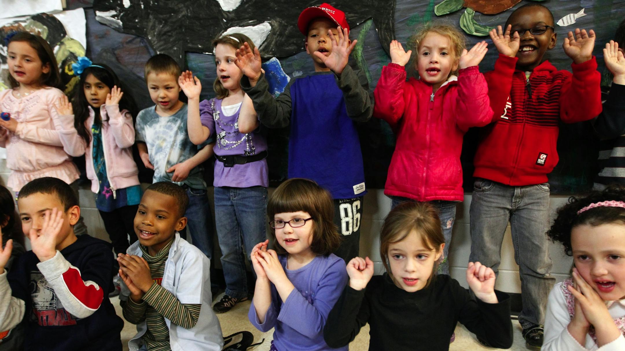 At the science fair of the Harambee Elementary School, the kindergarteners in Becky Wellington's class sang an adapted "Lion King" song about the ocean.