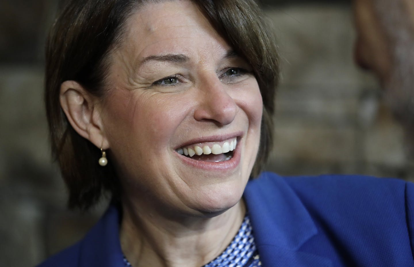 Democratic presidential candidate Sen. Amy Klobuchar, D-Minn., smiles during a campaign event at a coffee shop Monday, Sept. 30, 2019, in Seattle. (AP Photo/Elaine Thompson)