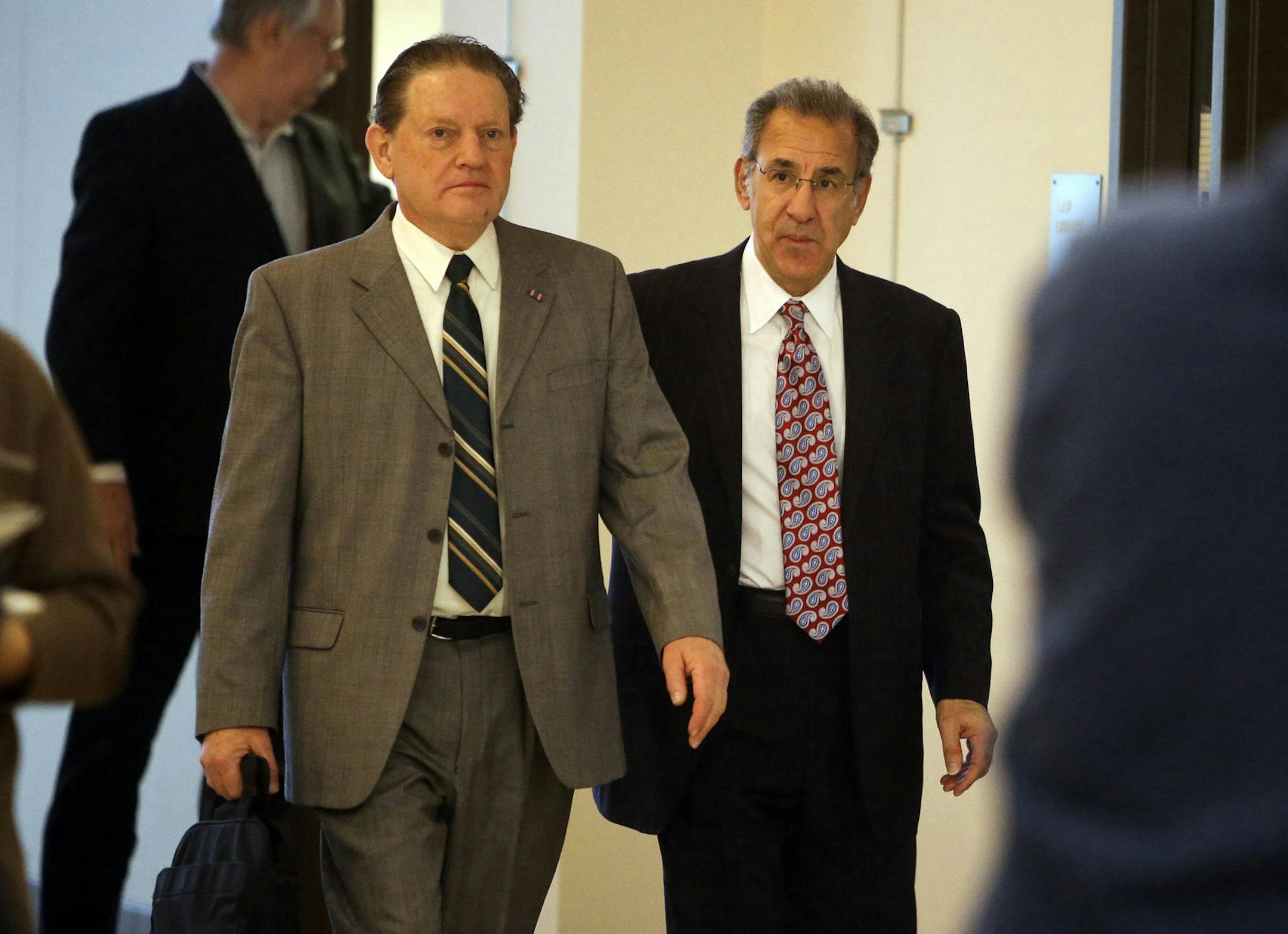 Byron Smith, left, heads into court with his lawyer, Steve Meshbesher, during the Smith's trial in the shooting deaths of 17-year-old Nick Brady and 18-year-old Haile Kifer, at the Morrison County Courthouse in Little Falls, Minn., on Tuesday, April 29, 2014. (David Joles/Minneapolis Star Tribune/MCT) ORG XMIT: 11523321 ORG XMIT: MIN1404291657402715
