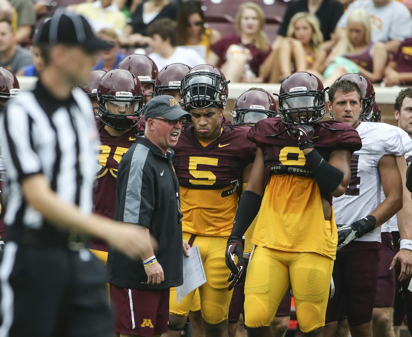 University of Minnesota head coach Jerry Kill on the sidelines with his players during a scrimmage Saturday, Aug. 9, 2014, at TCF Bank Stadium in Minneapolis.] (DAVID JOLES/STARTRIBUNE) djoles@startribune University of Minnesota Gophers football team scrimmage Saturday, Aug. 9, 2014, at TCF Bank Stadium in Minneapolis.