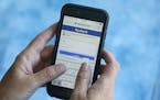 FILE- In this Aug. 21, 2018, file photo a Facebook start page is shown on a smartphone in Surfside, Fla. Facebook said Thursday, March 21, 2019, that 