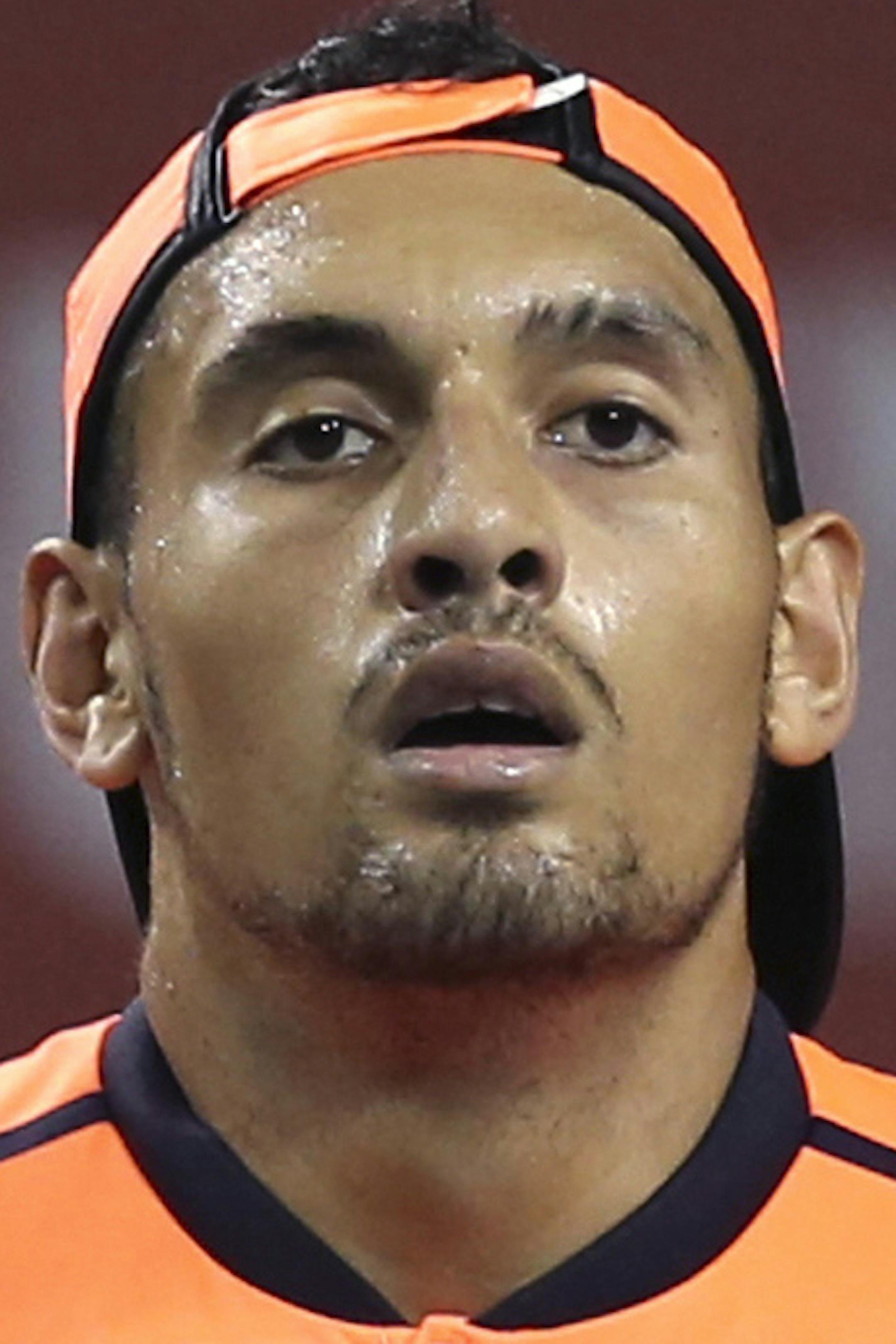 FILE - In this Saturday, Oct. 8, 2016, file photo, Australia's Nick Kyrgios reacts after getting a point against Gael Monfils of France during the semifinal match of Japan Open tennis championships in Tokyo. The ATP has suspended Nick Kyrgios for at least 3 weeks and fined him extra $25,000 for conduct contrary to 'integrity' of tennis. (AP Photo/Koji Sasahara, File)