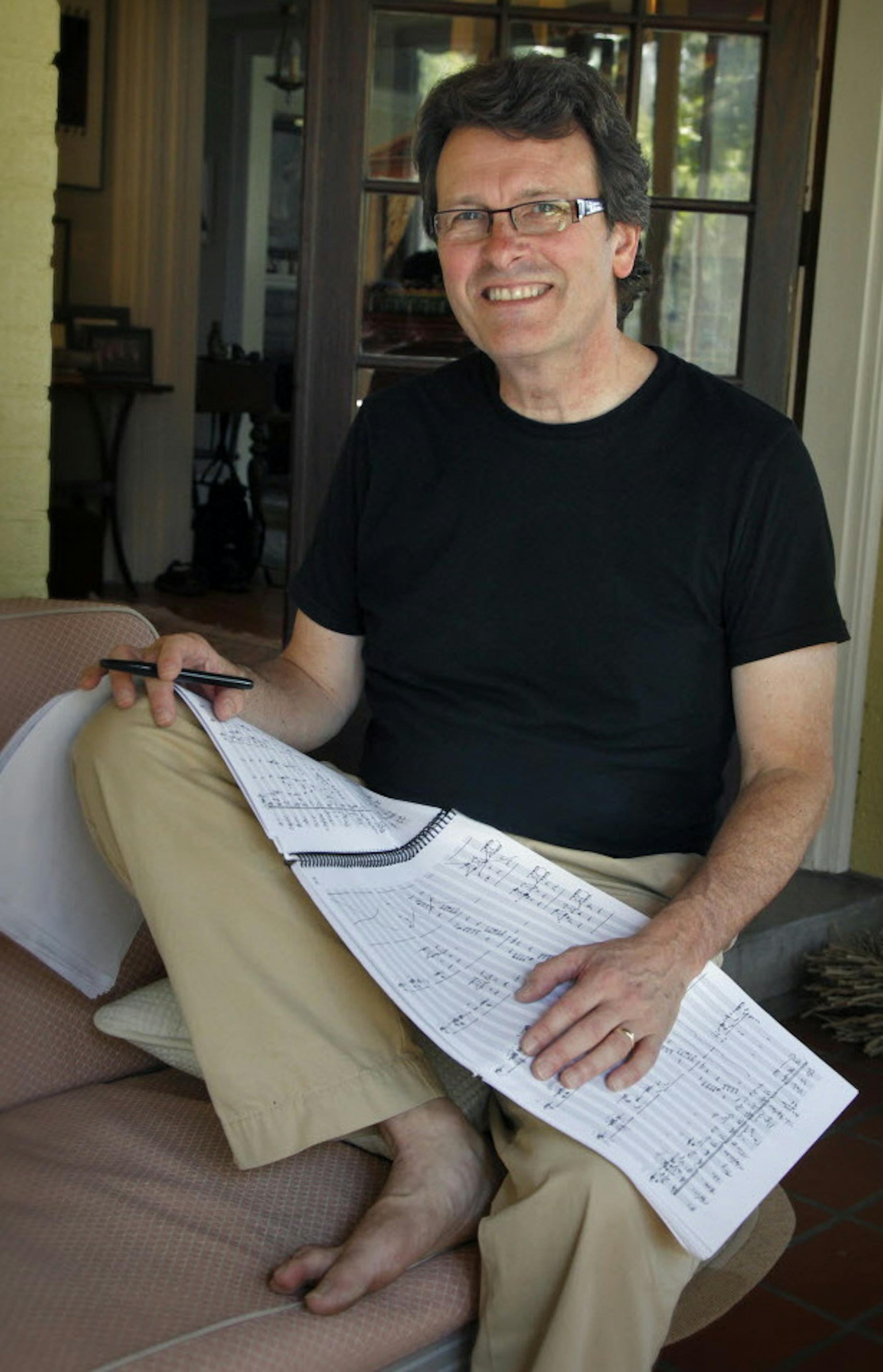 Composers Stephen and Gregory Paulus, father and son. They are collaborating on a piece that will have its premiere with the Minnesota Orchestra this September. Stephen lives in St. Paul and Son Gregory lives in New York and works long distance with his father on the music. Stephen Paulus with the work in progress.] TOM WALLACE ‚Ä¢ twallace@startribune.com __Assignments #20019386A_ August 23, 2011_ SLUG: orch0925_ EXTRA INFORMATION: (CQ) By the subject.