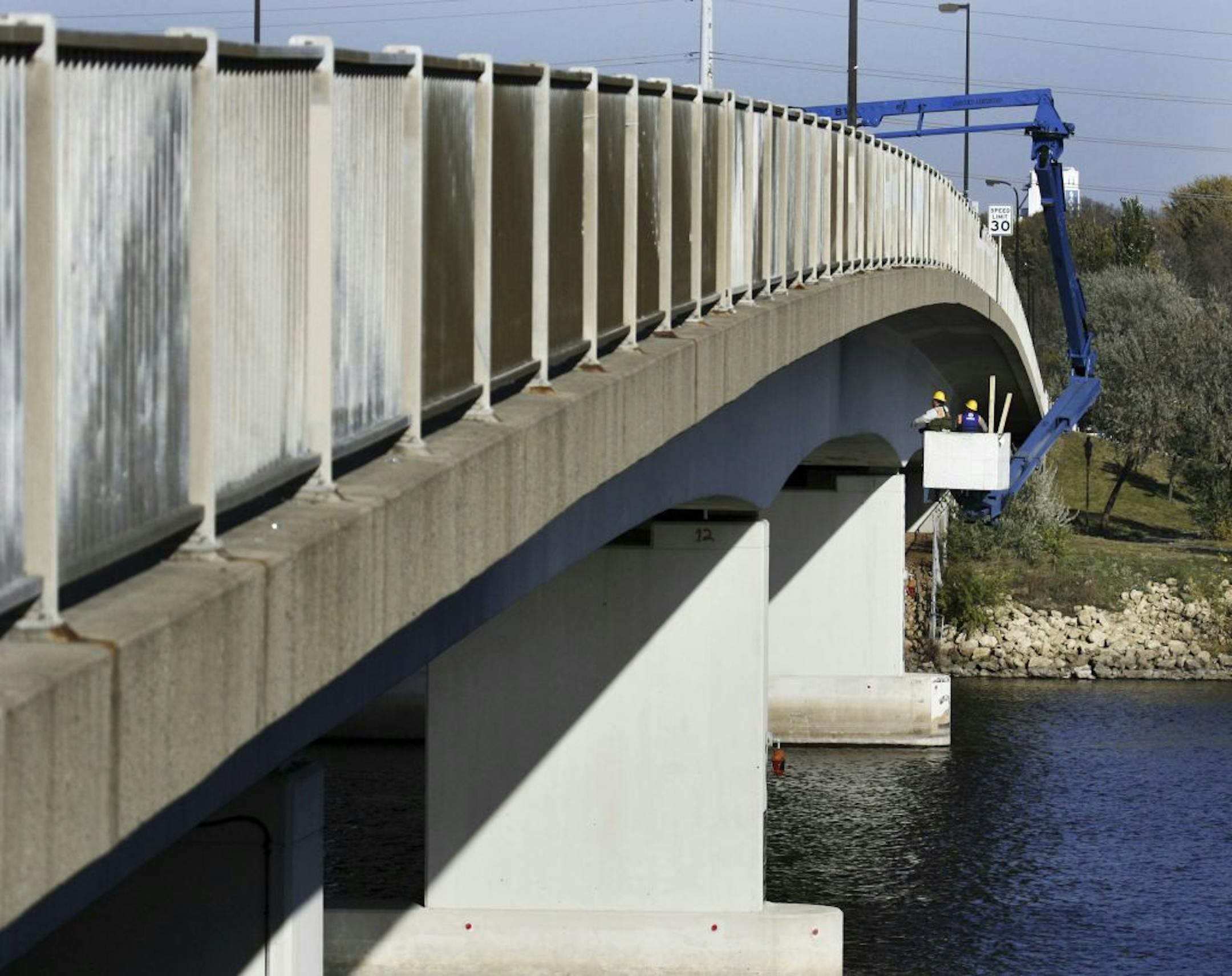 The Plymouth Avenue Bridge was shut down and an inspection took place Friday afternoon. In this photo:]