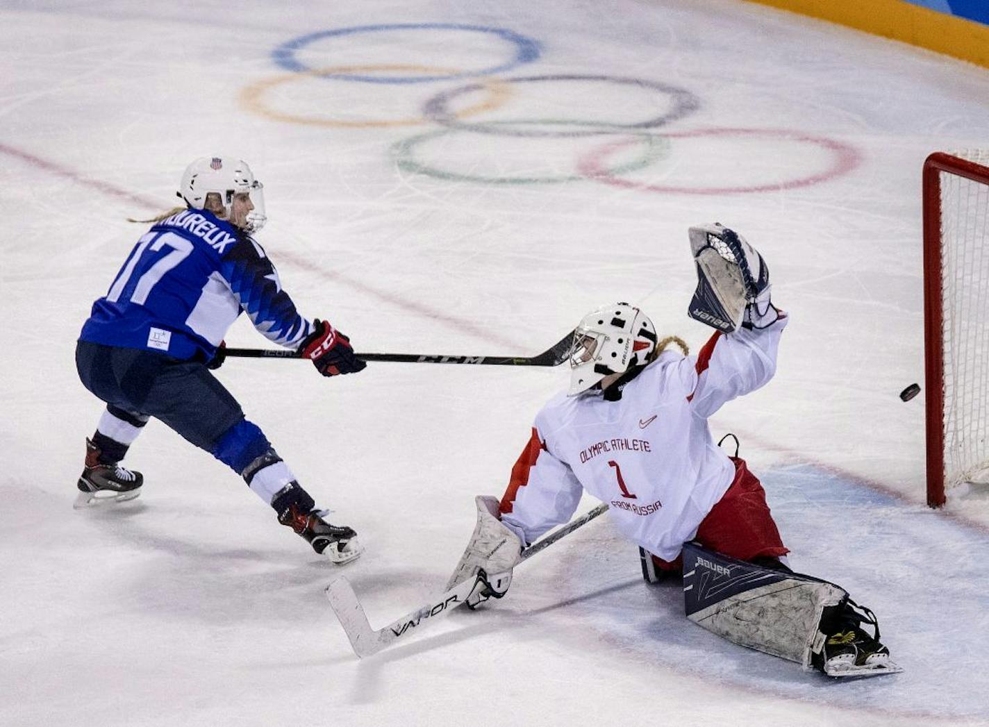 Jocelyne Lamoureux-Davidson (17) shot the puck past Goalie Valeria Tarakanova (1) for a goal in the second period.